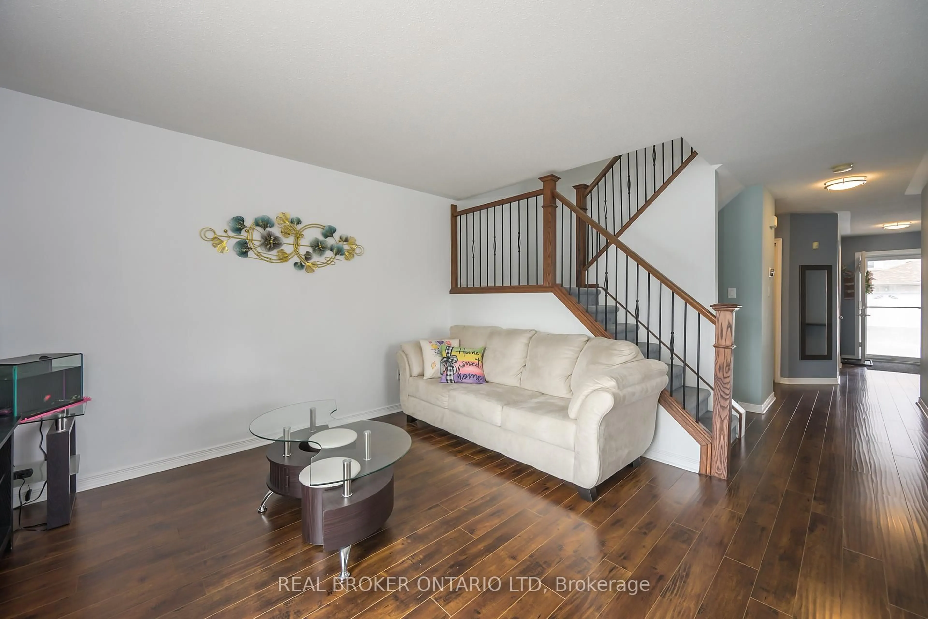 Living room with furniture, wood/laminate floor for 195 Barker St #26, London East Ontario N5Y 1Y2