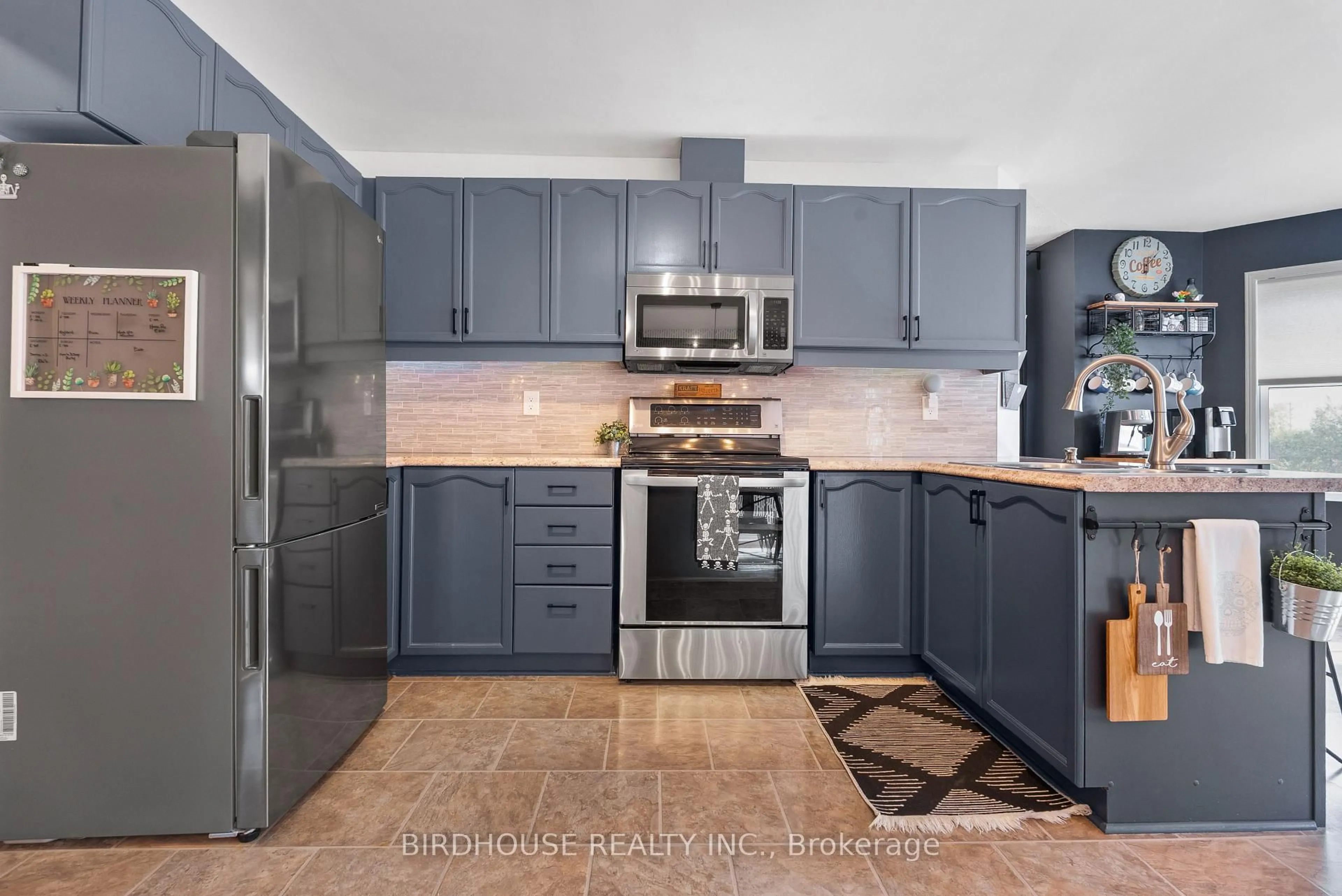 Open concept kitchen, ceramic/tile floor for 56 Champlain Blvd, Kawartha Lakes Ontario K9V 4R1