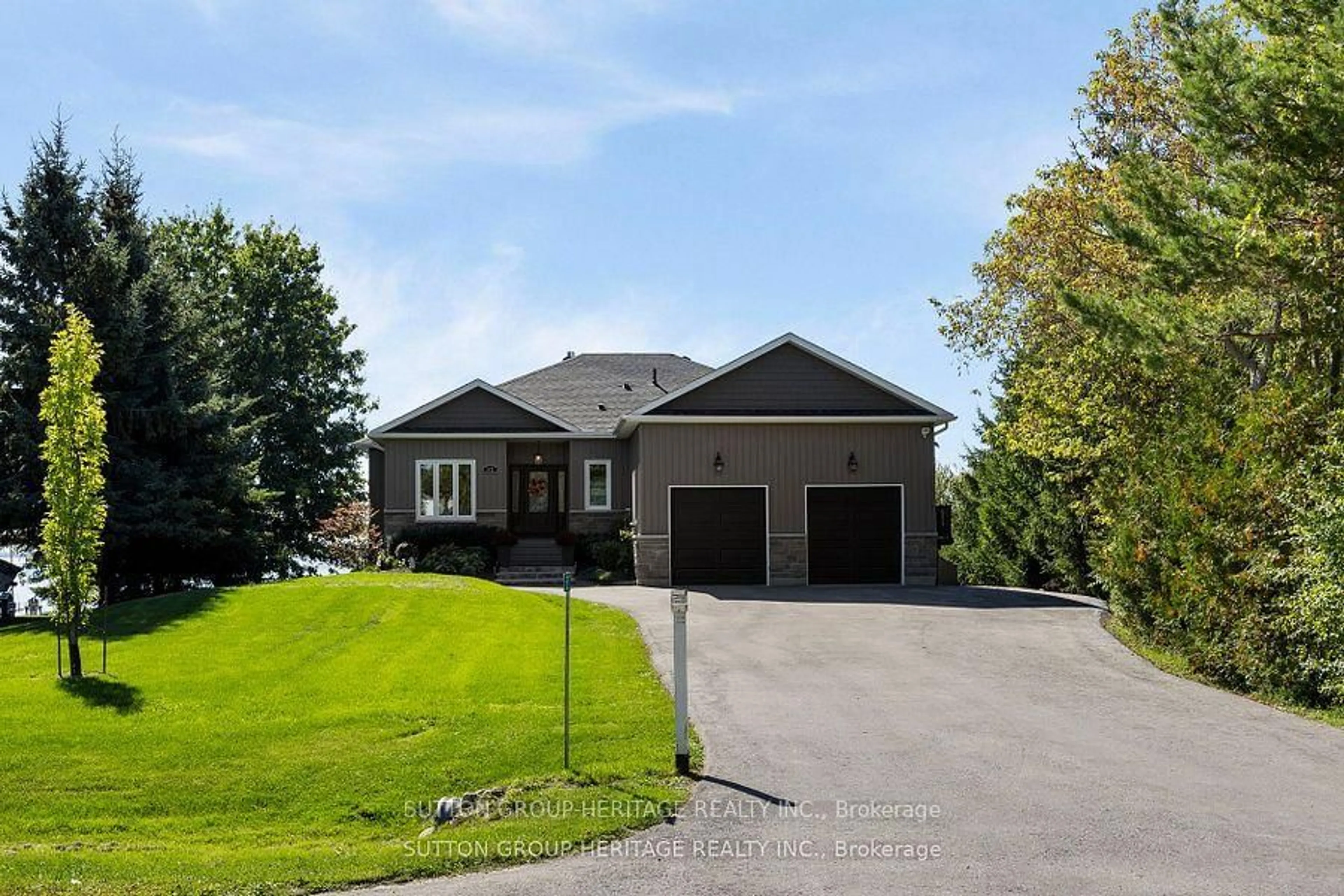 Home with brick exterior material, unknown for 52 Hillside Dr, Kawartha Lakes Ontario K0M 2C0