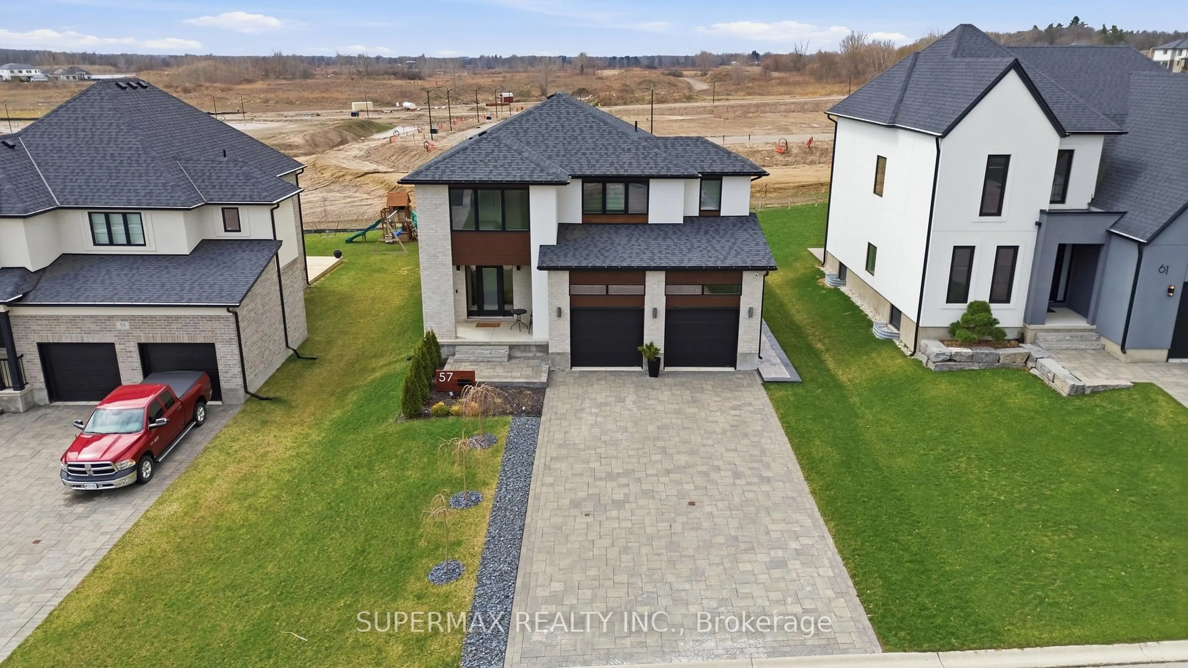 A pic from outside/outdoor area/front of a property/back of a property/a pic from drone, unknown for 57 CRESTVIEW Dr, Middlesex Centre Ontario N0L 1R0