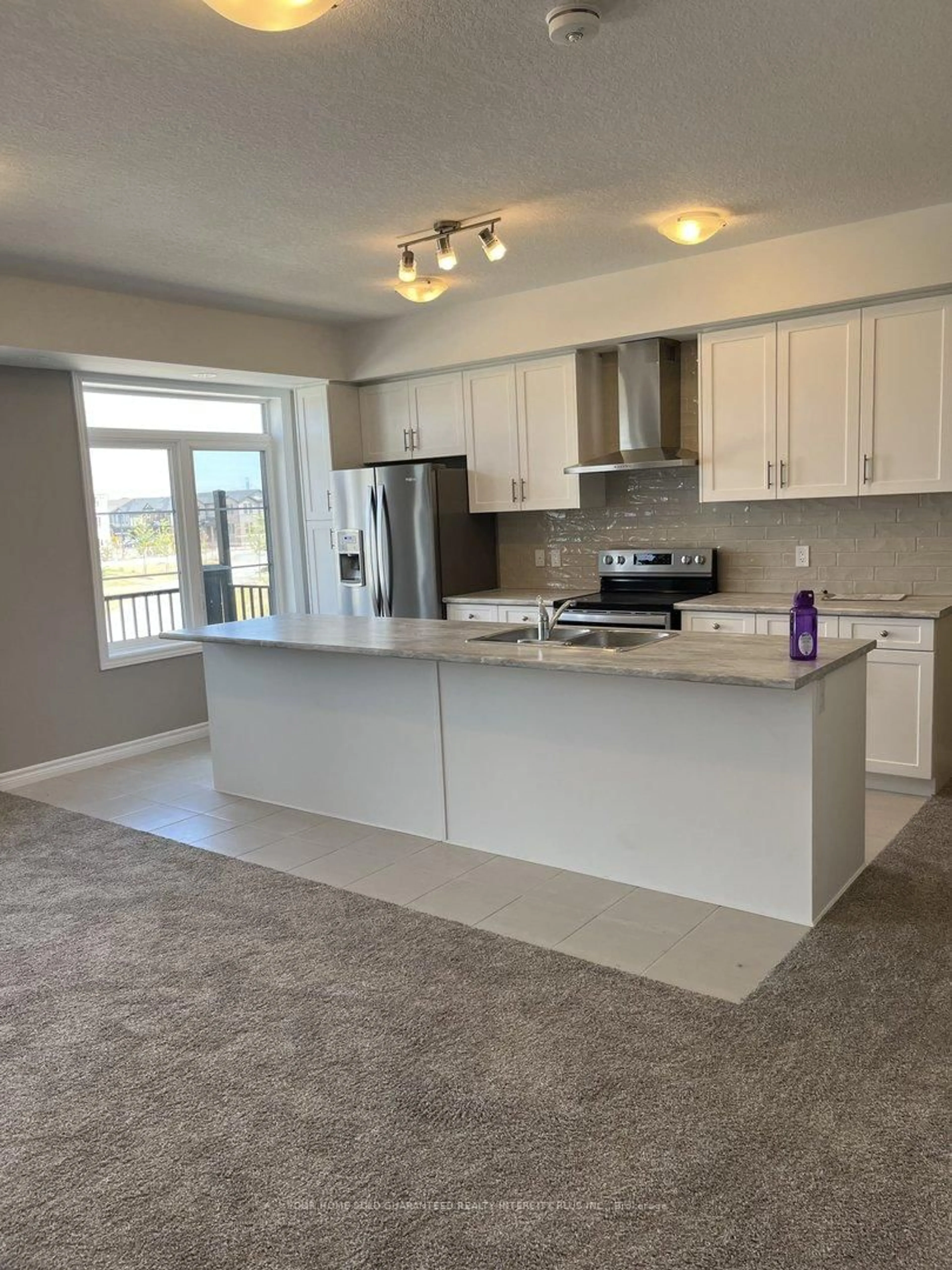 Open concept kitchen, ceramic/tile floor for 164 Wheat Lane #82, Kitchener Ontario N2R 1R7