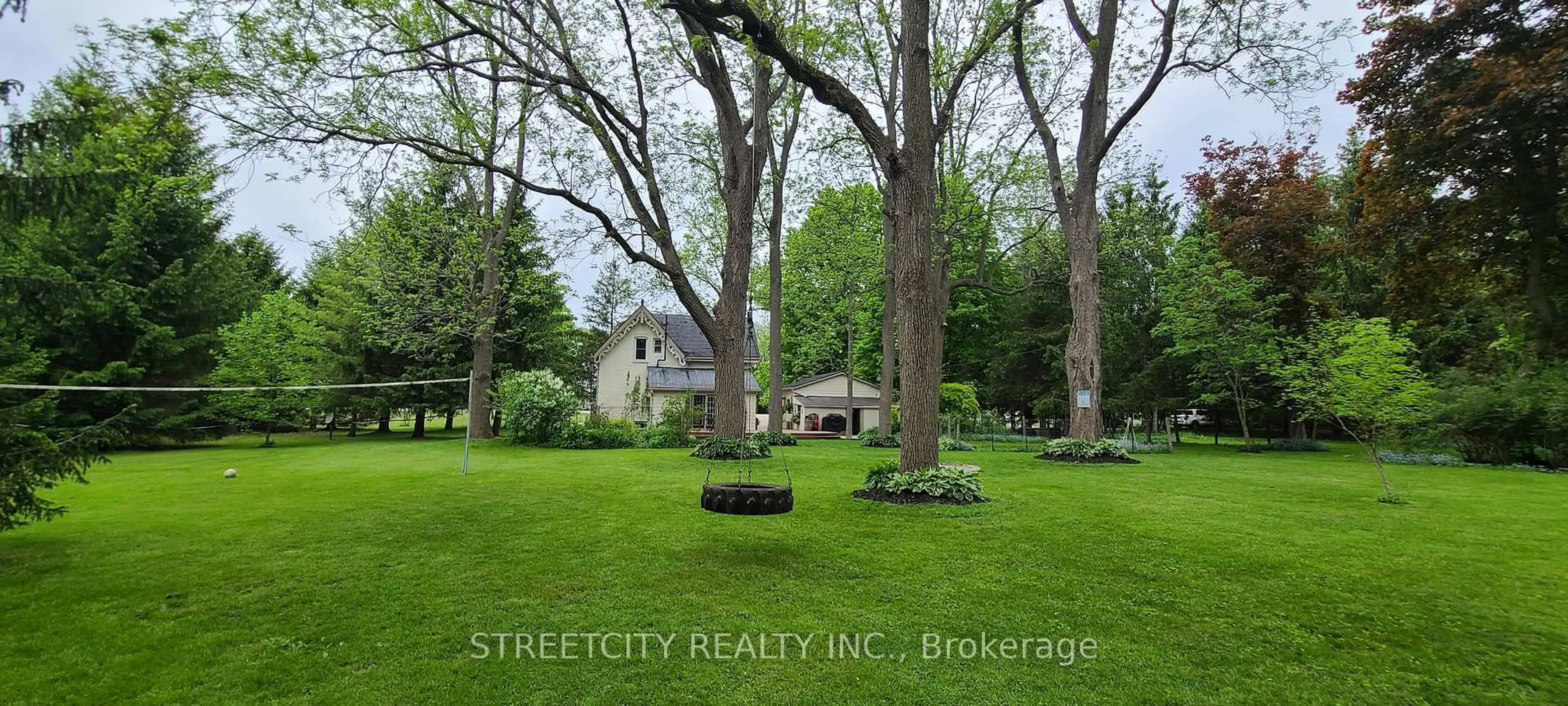 A pic from outside/outdoor area/front of a property/back of a property/a pic from drone, street for 38803 Talbot Line, Southwold Ontario N5P 3T2