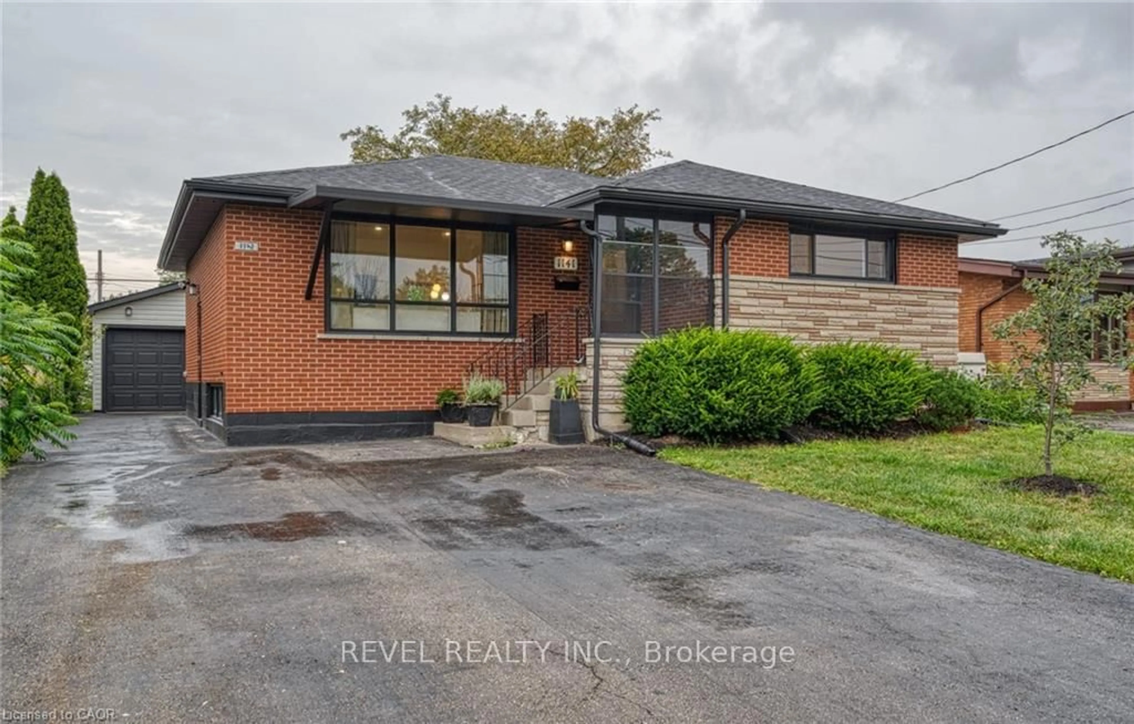 Home with brick exterior material, street for 1141 Mohawk Rd, Hamilton Ontario L8T 2S4