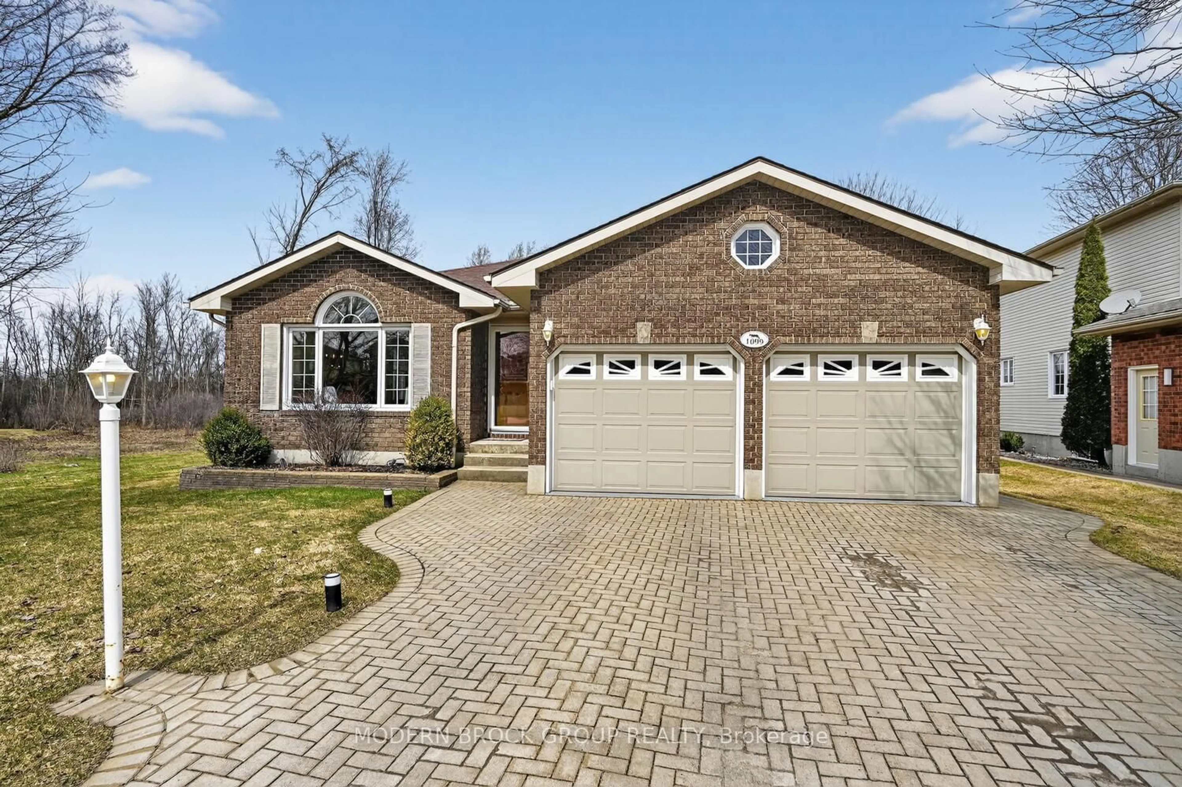 Home with brick exterior material, street for 1099 Bridlewood Dr, Brockville Ontario K6V 7G2