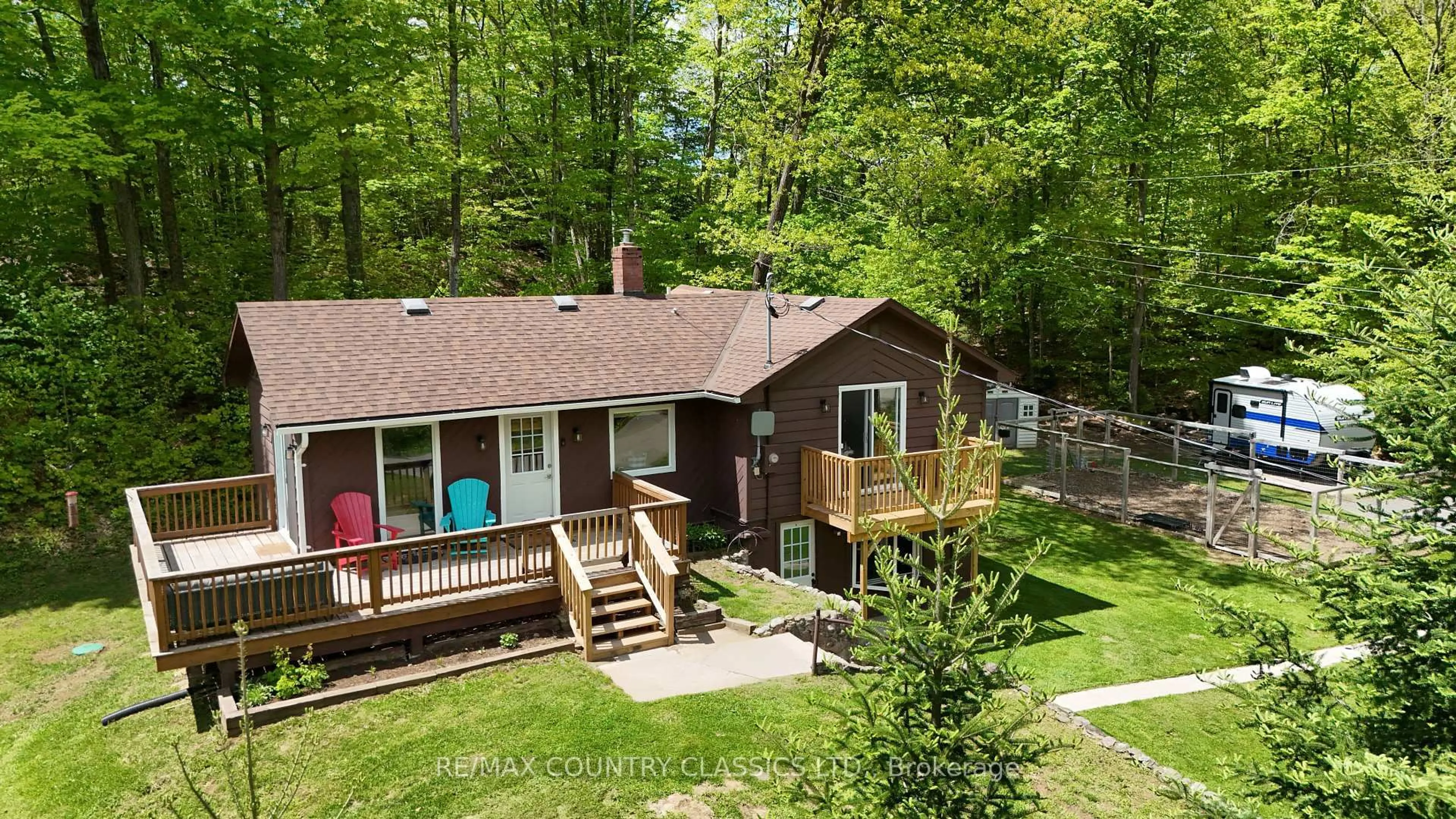 A pic from outside/outdoor area/front of a property/back of a property/a pic from drone, forest/trees view for 164 Trout Lake Rd, Bancroft Ontario K0L 1C0
