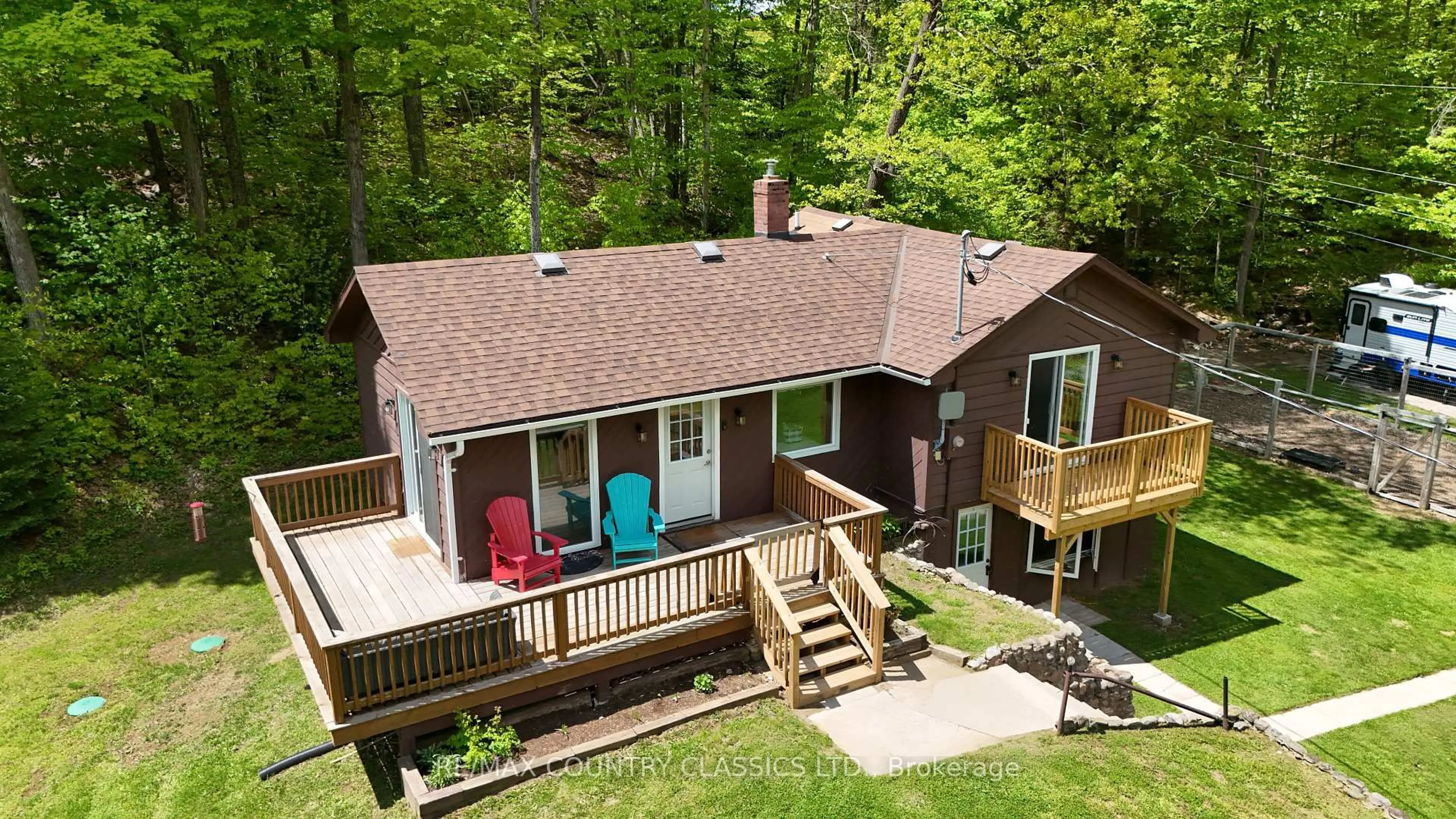 A pic from outside/outdoor area/front of a property/back of a property/a pic from drone, water/lake/river/ocean view for 164 Trout Lake Rd, Bancroft Ontario K0L 1C0