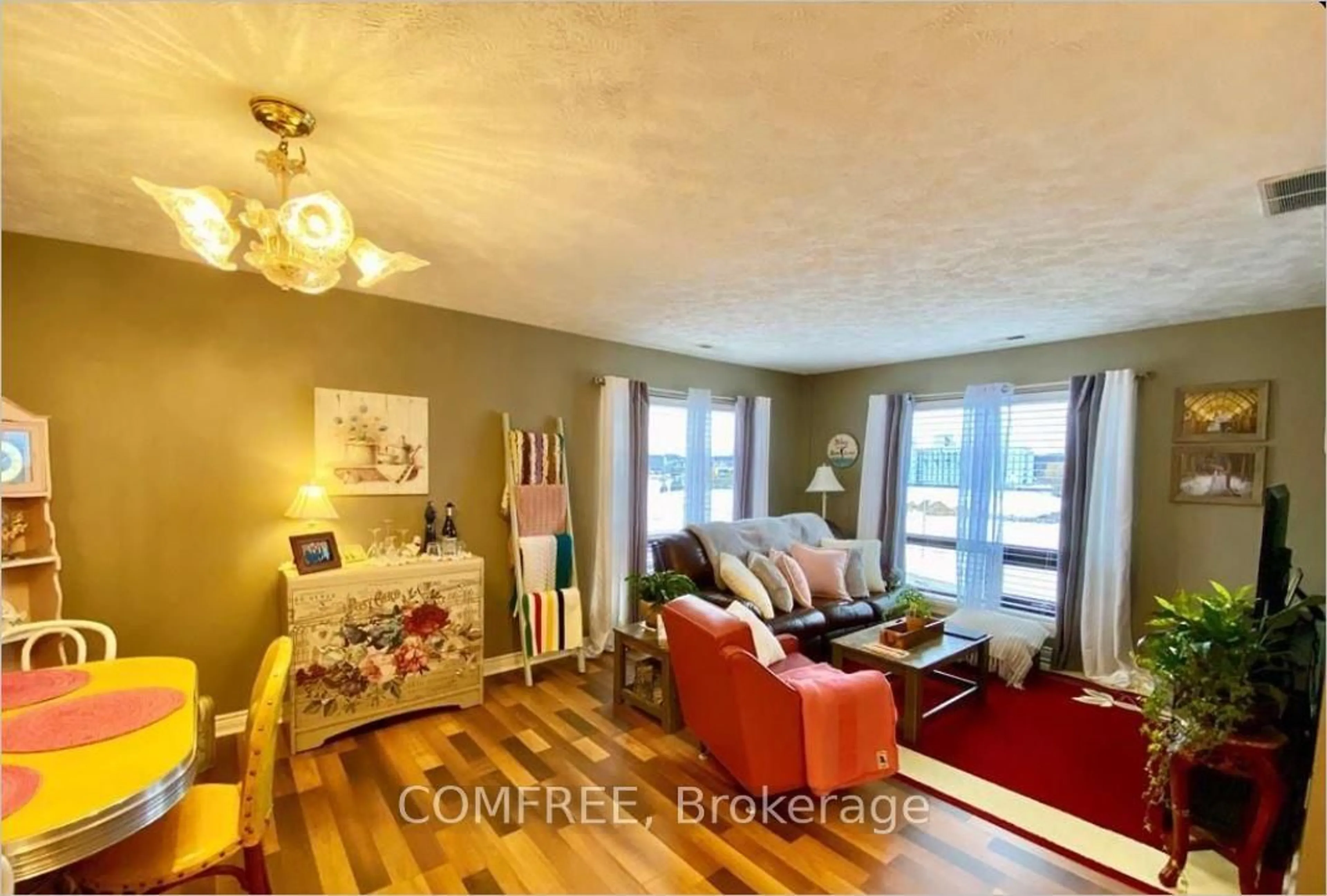 Living room with furniture, wood/laminate floor for 1717 2nd Ave #401, Owen Sound Ontario N4K 6V4