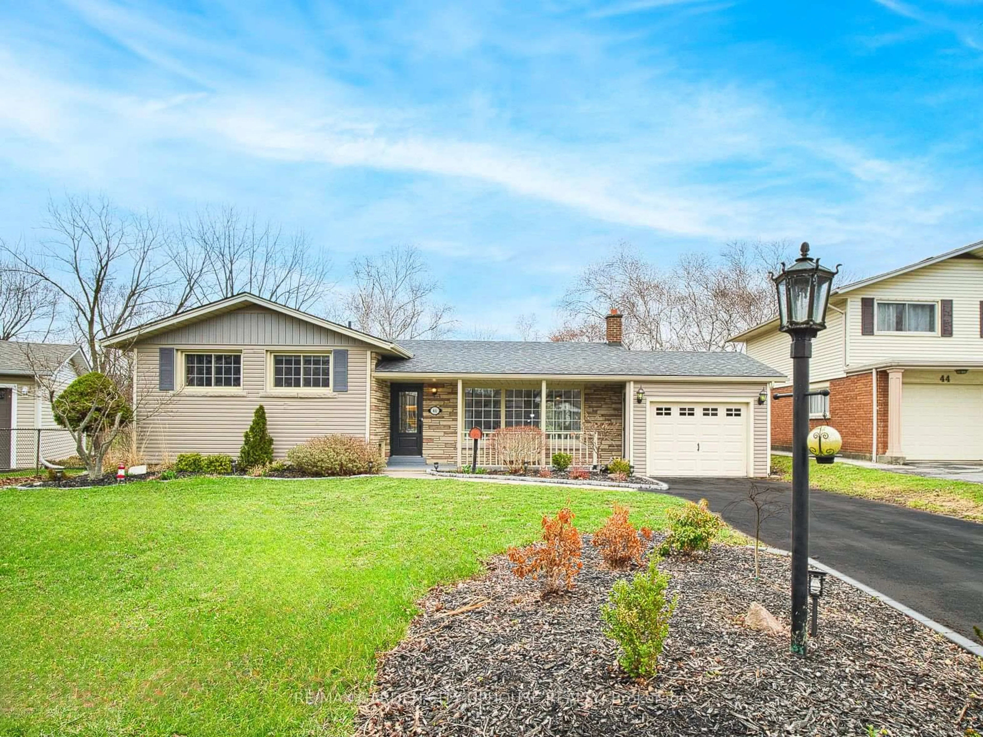 Home with brick exterior material, street for 46 STRATHCONA Dr, St. Catharines Ontario L2M 2B1