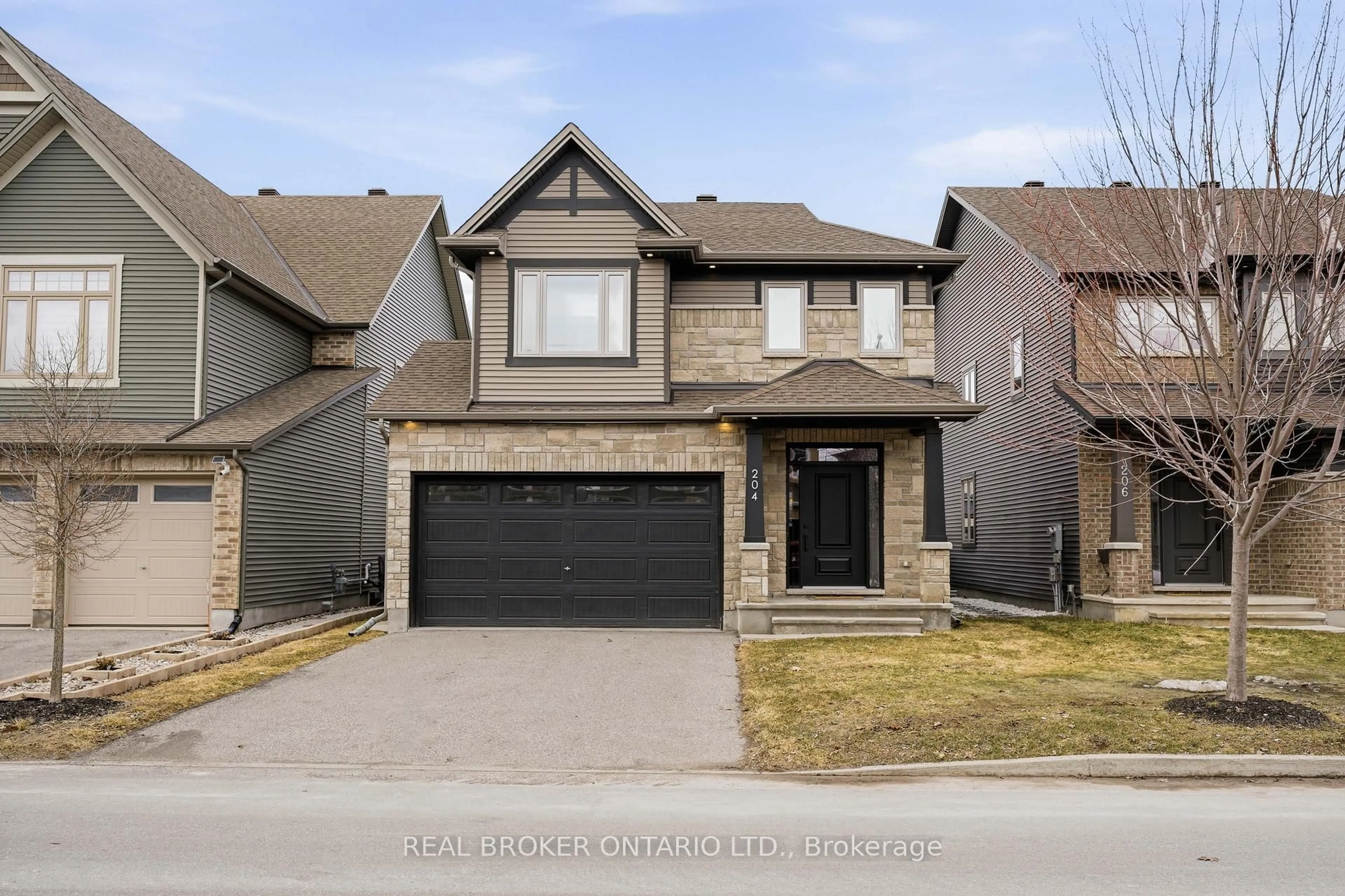 Home with brick exterior material, street for 204 Trollius Way, Ottawa Ontario K1T 0R7