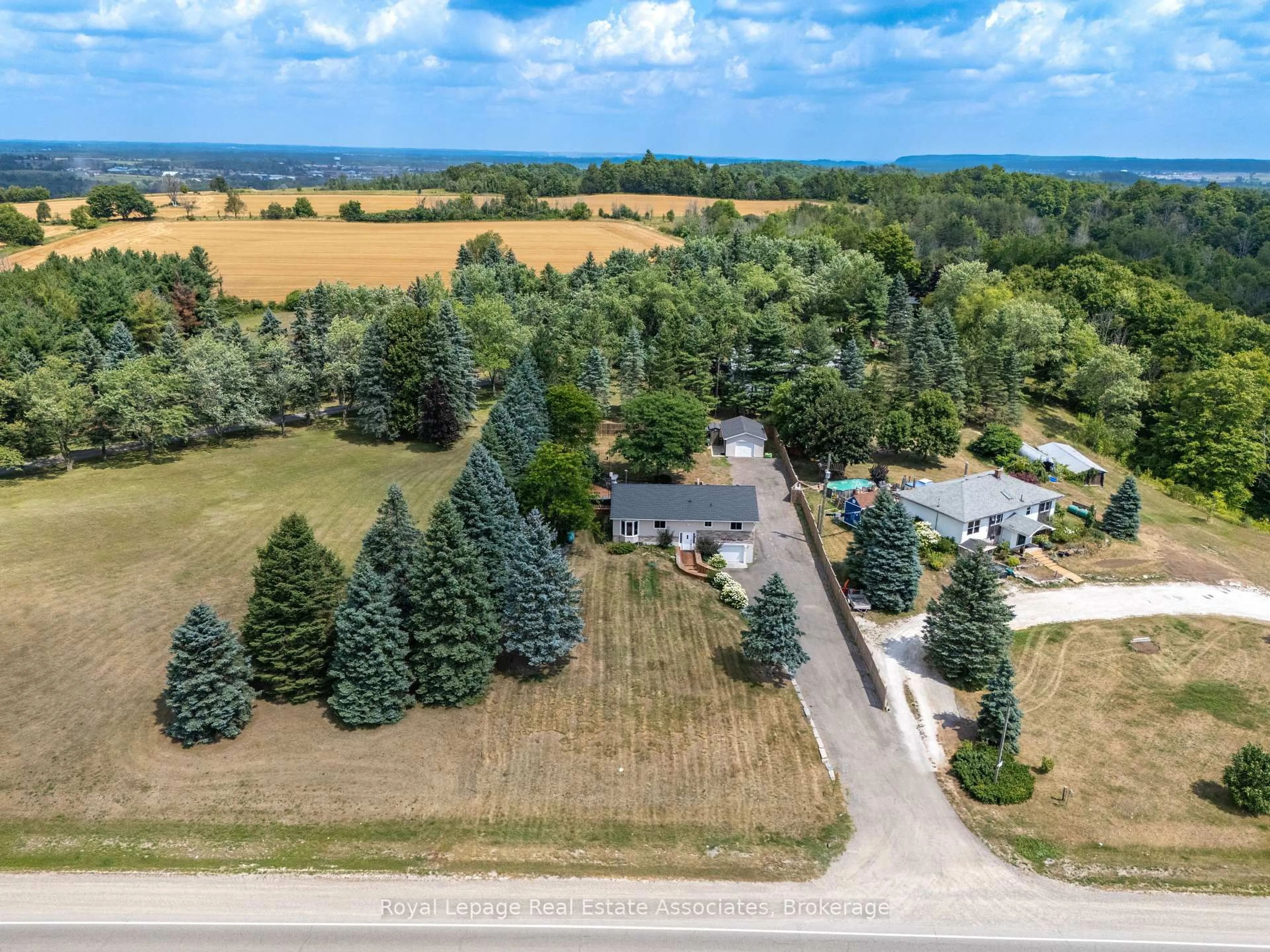 A pic from outside/outdoor area/front of a property/back of a property/a pic from drone, water/lake/river/ocean view for 5527 Trafalgar Rd, Erin Ontario N0B 1T0