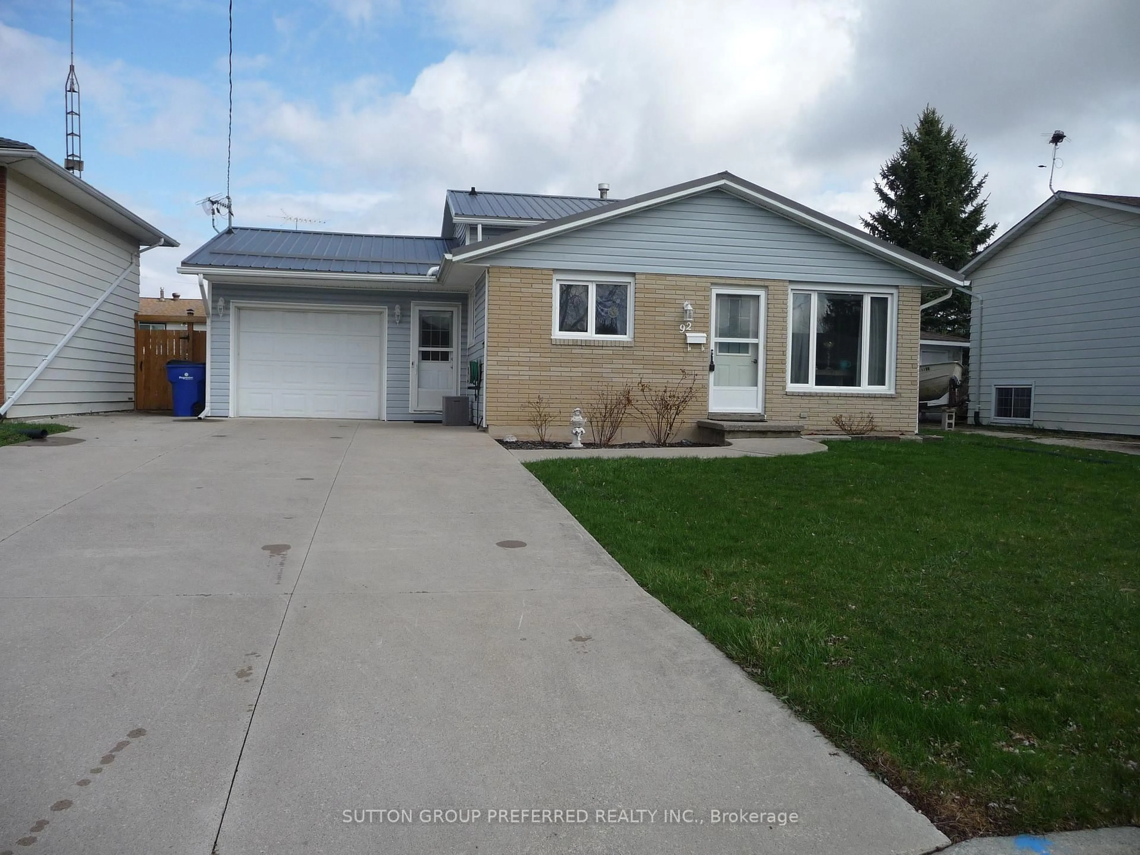 Home with vinyl exterior material, street for 92 Earl St, Chatham-Kent Ontario N8A 1C7