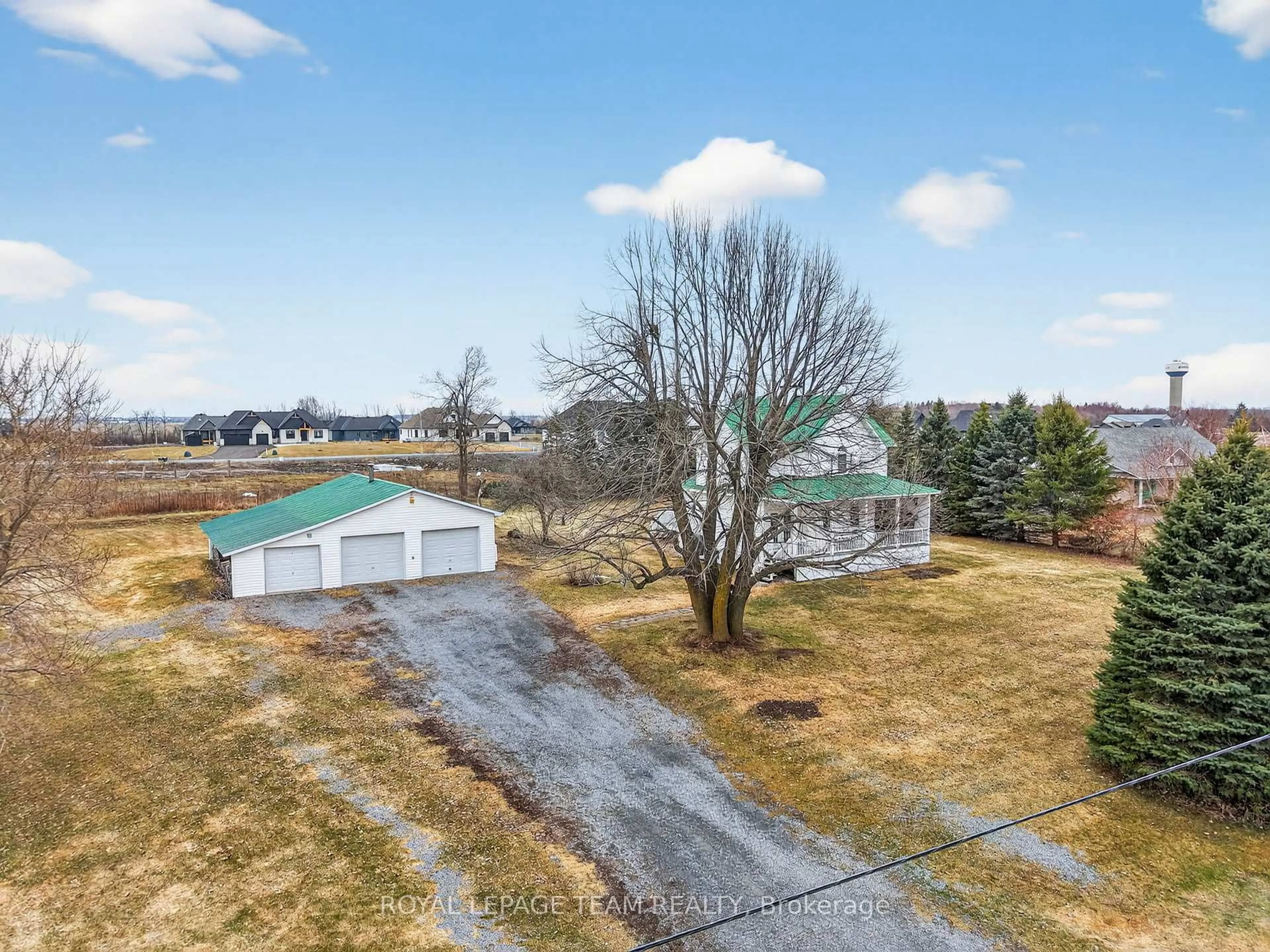 A pic from outside/outdoor area/front of a property/back of a property/a pic from drone, water/lake/river/ocean view for 180 Route 500 Rd, Russell Ontario K4R 1E5