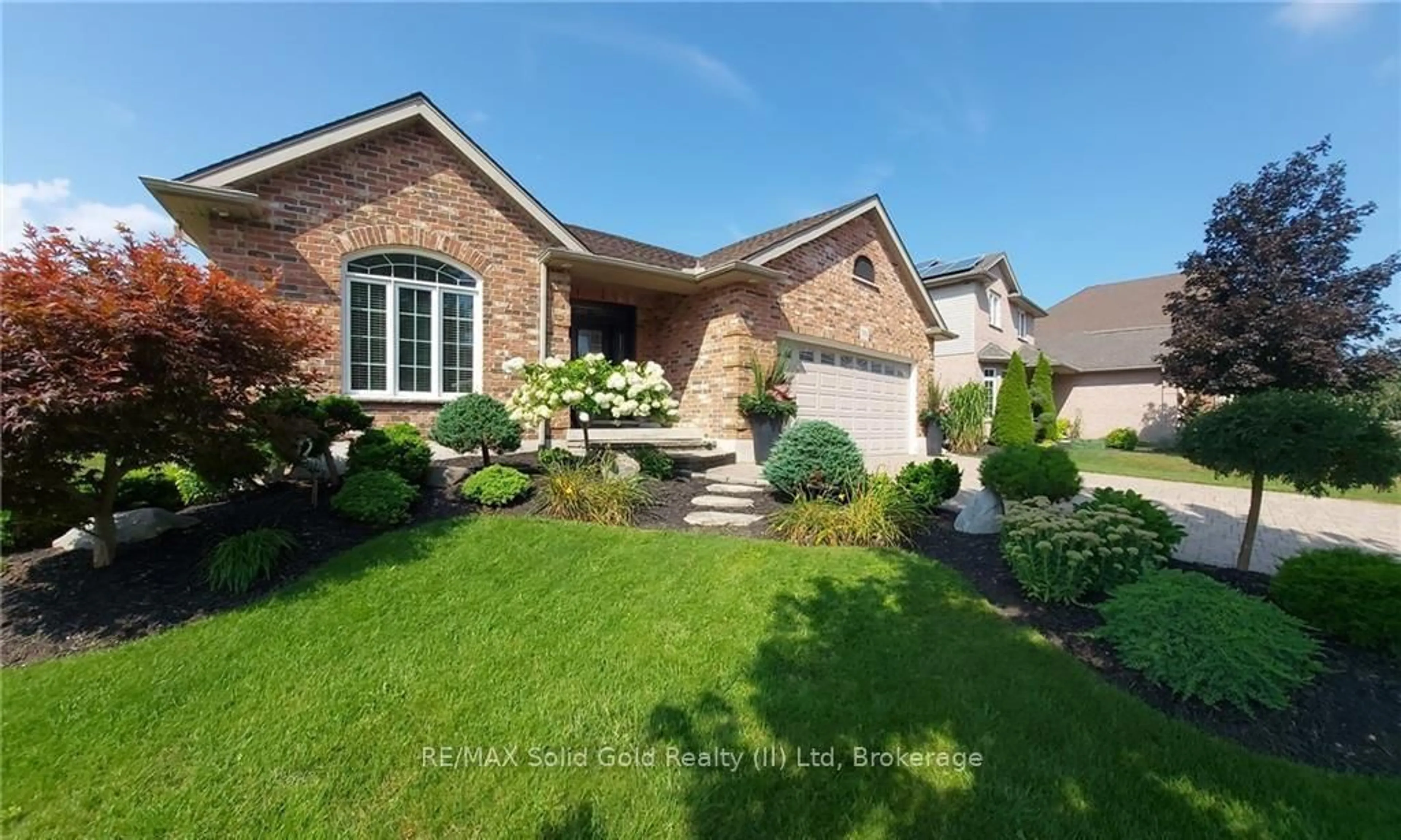 Home with brick exterior material, street for 583 Lakeview Dr, Woodstock Ontario N4T 0A5