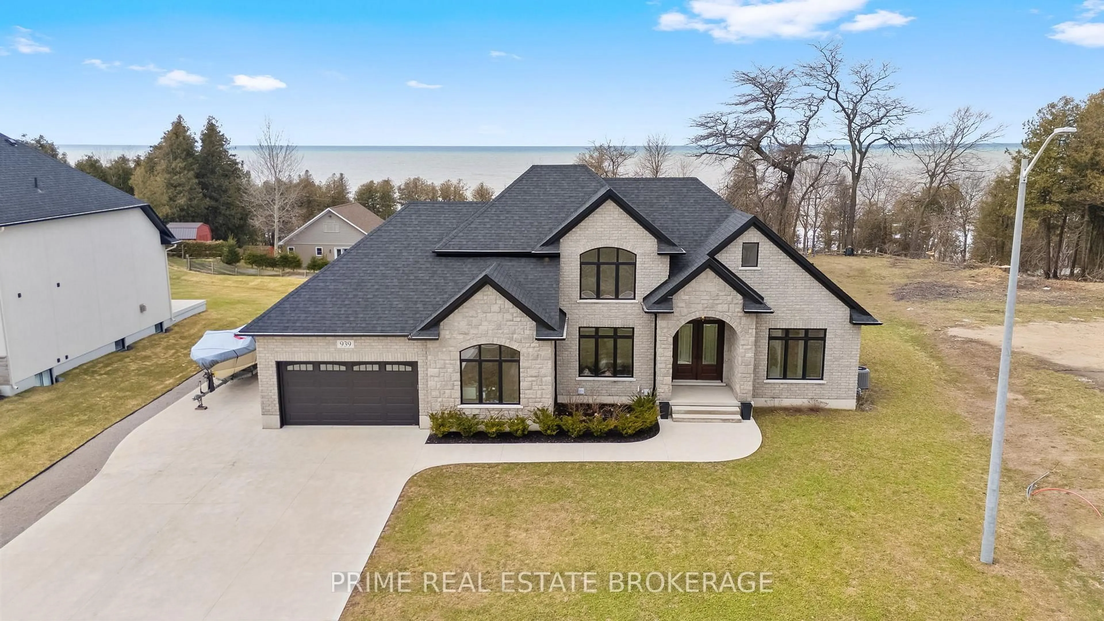 Home with brick exterior material, street for 939 Bogdanovic Way, Huron-Kinloss Ontario N2Z 0H4