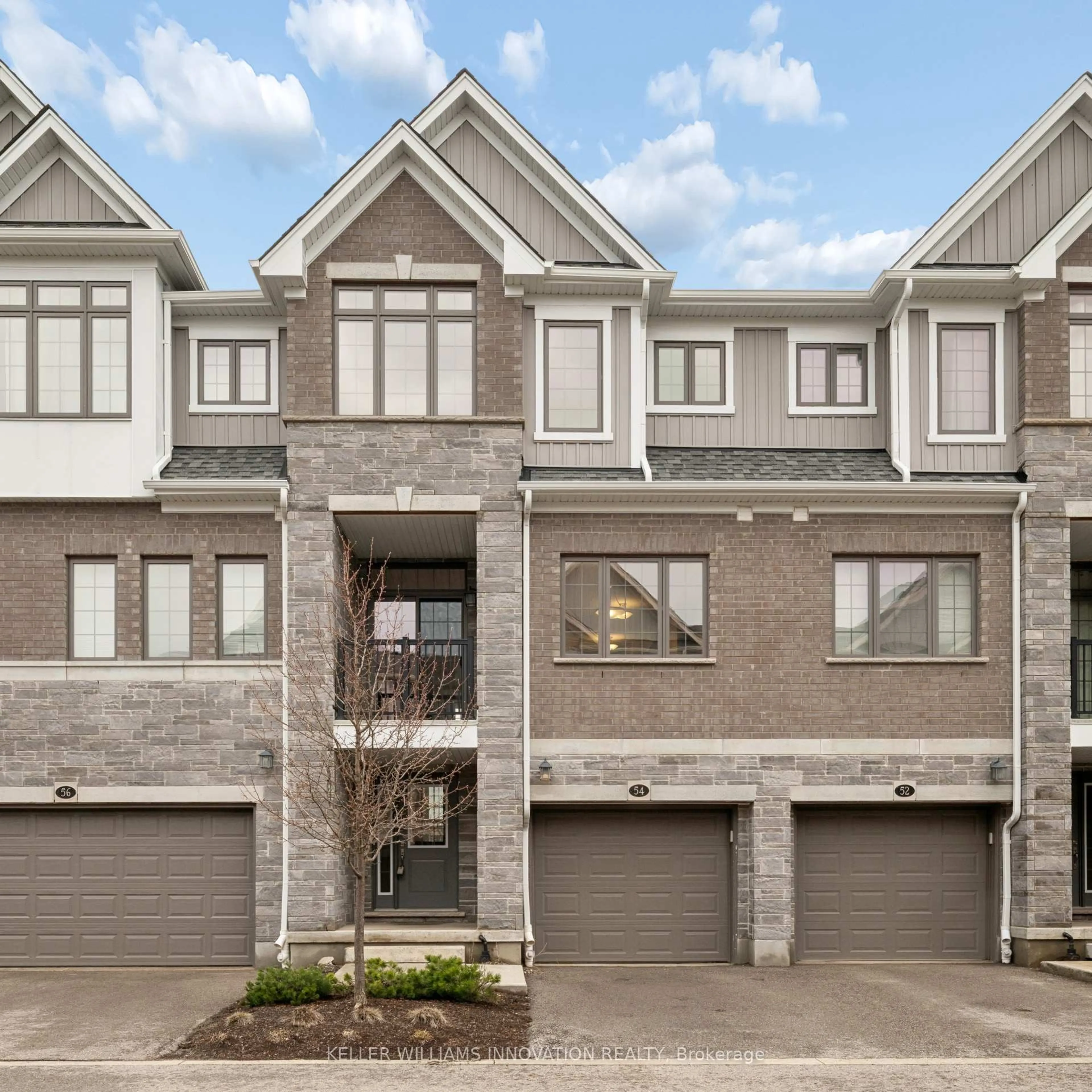 Home with brick exterior material, street for 54 Bank Swallow Cres, Kitchener Ontario N2P 0J7