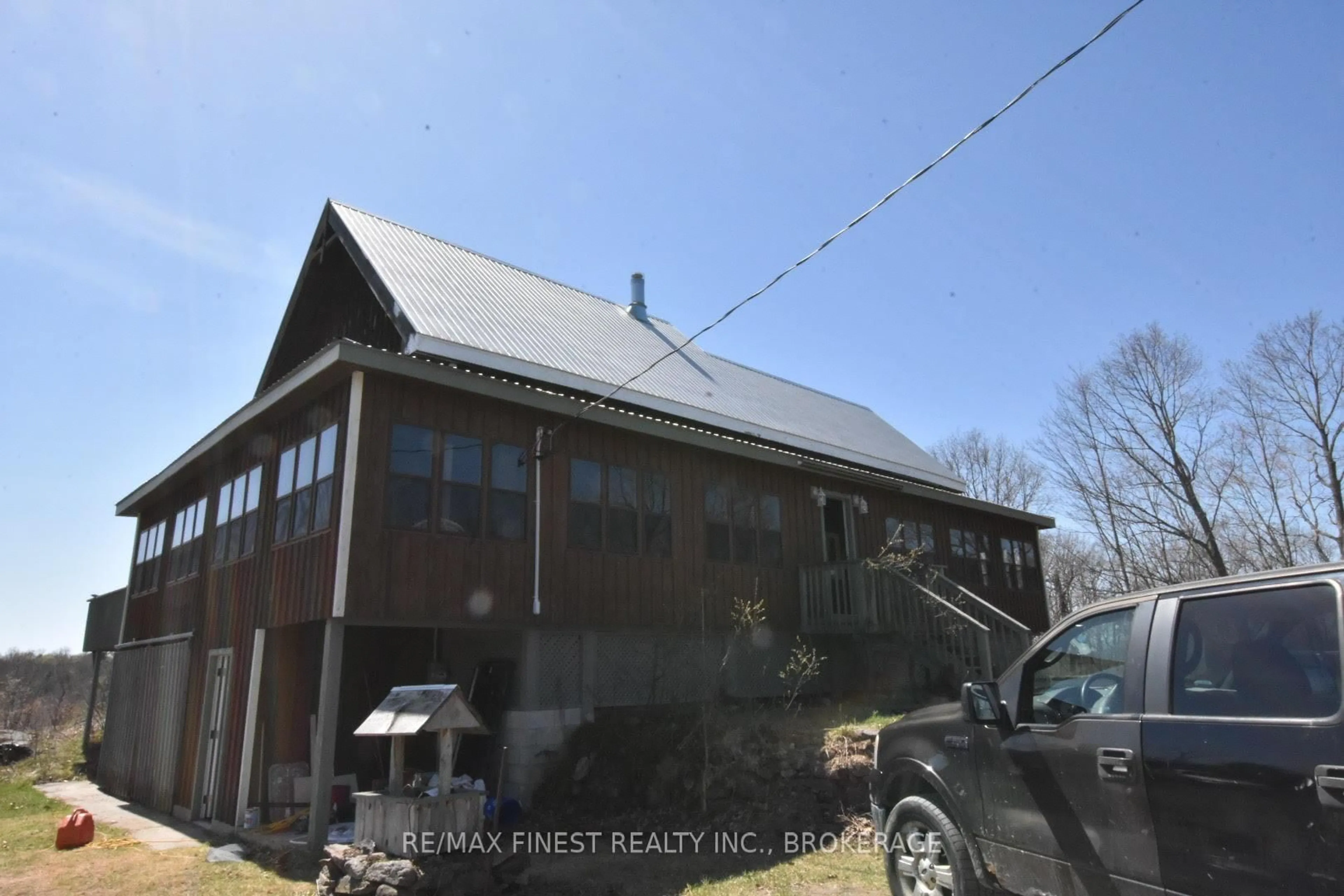 A pic from outside/outdoor area/front of a property/back of a property/a pic from drone, building for 1146 Fourth Lake Rd, Parham Ontario K0H 2K0