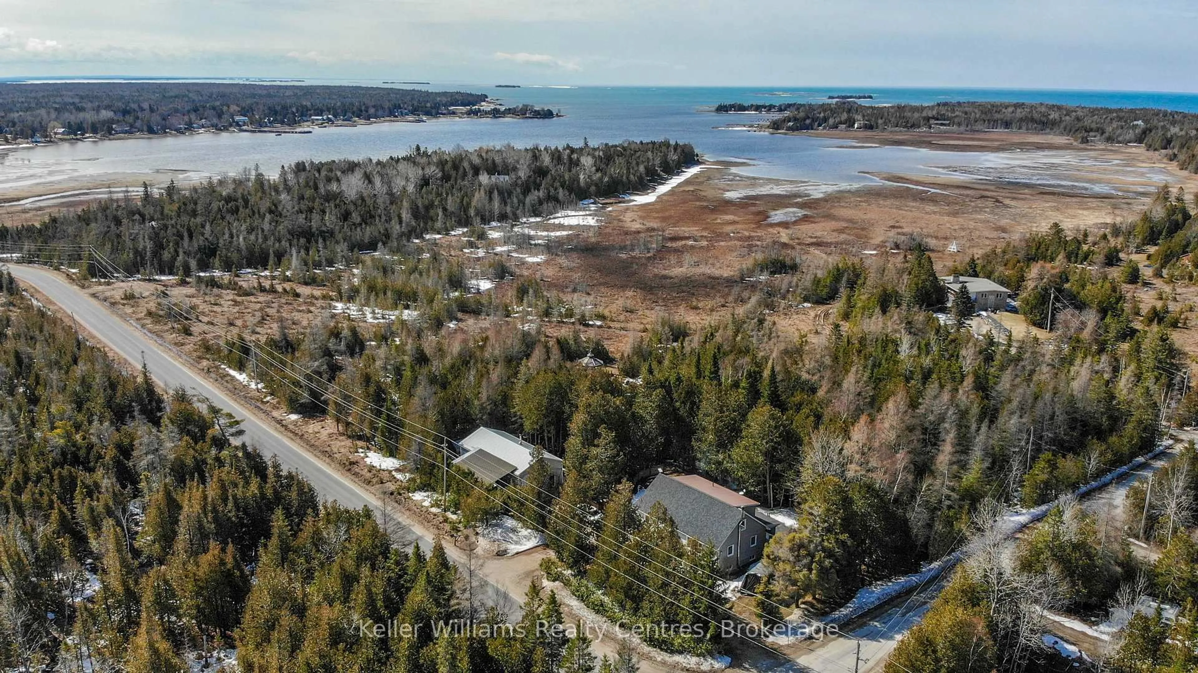 A pic from outside/outdoor area/front of a property/back of a property/a pic from drone, water/lake/river/ocean view for 668 Pike Bay Rd, Northern Bruce Peninsula Ontario N0H 2T0