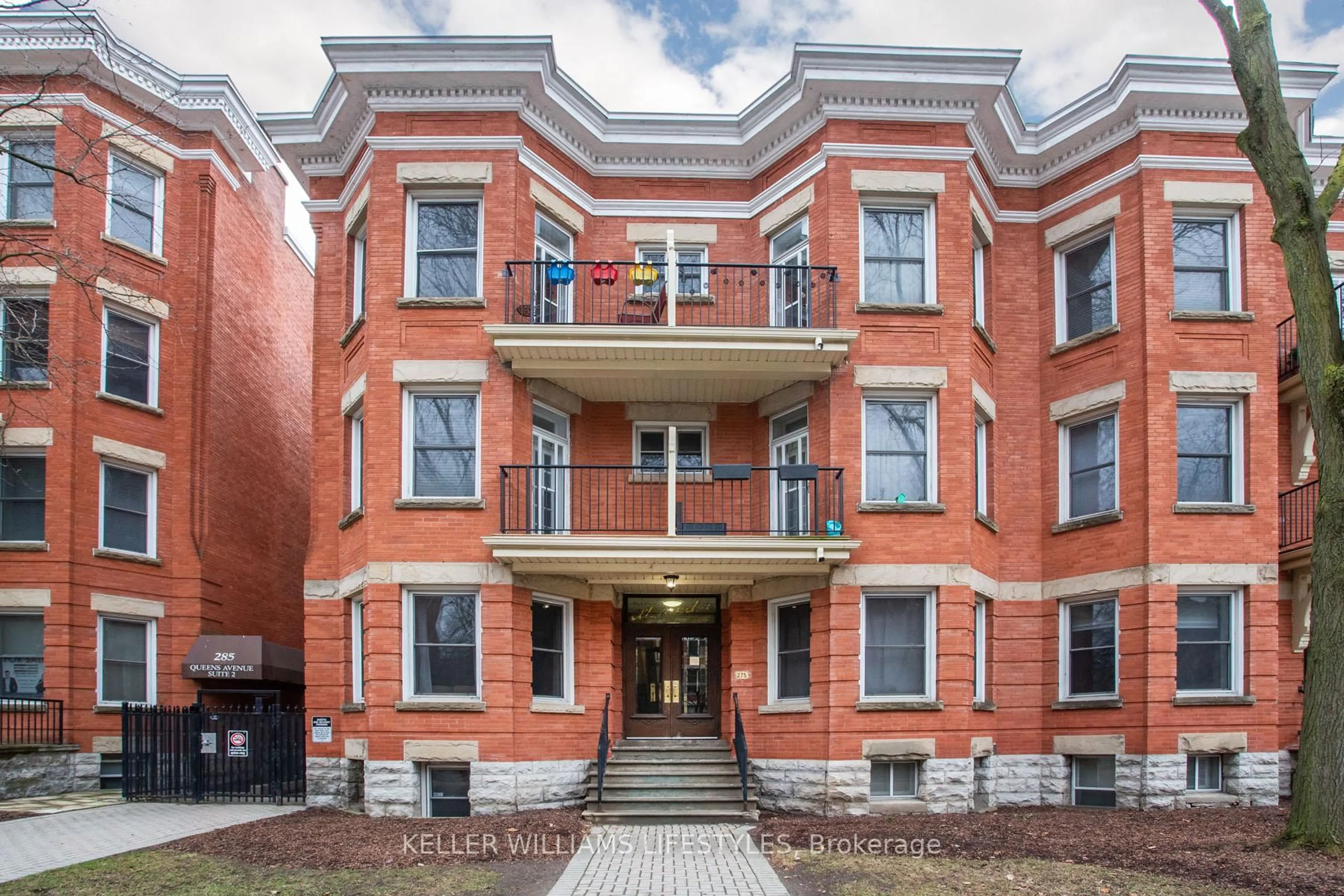 Home with brick exterior material, building for 275 Queens Ave #105, London East Ontario N6B 1X2
