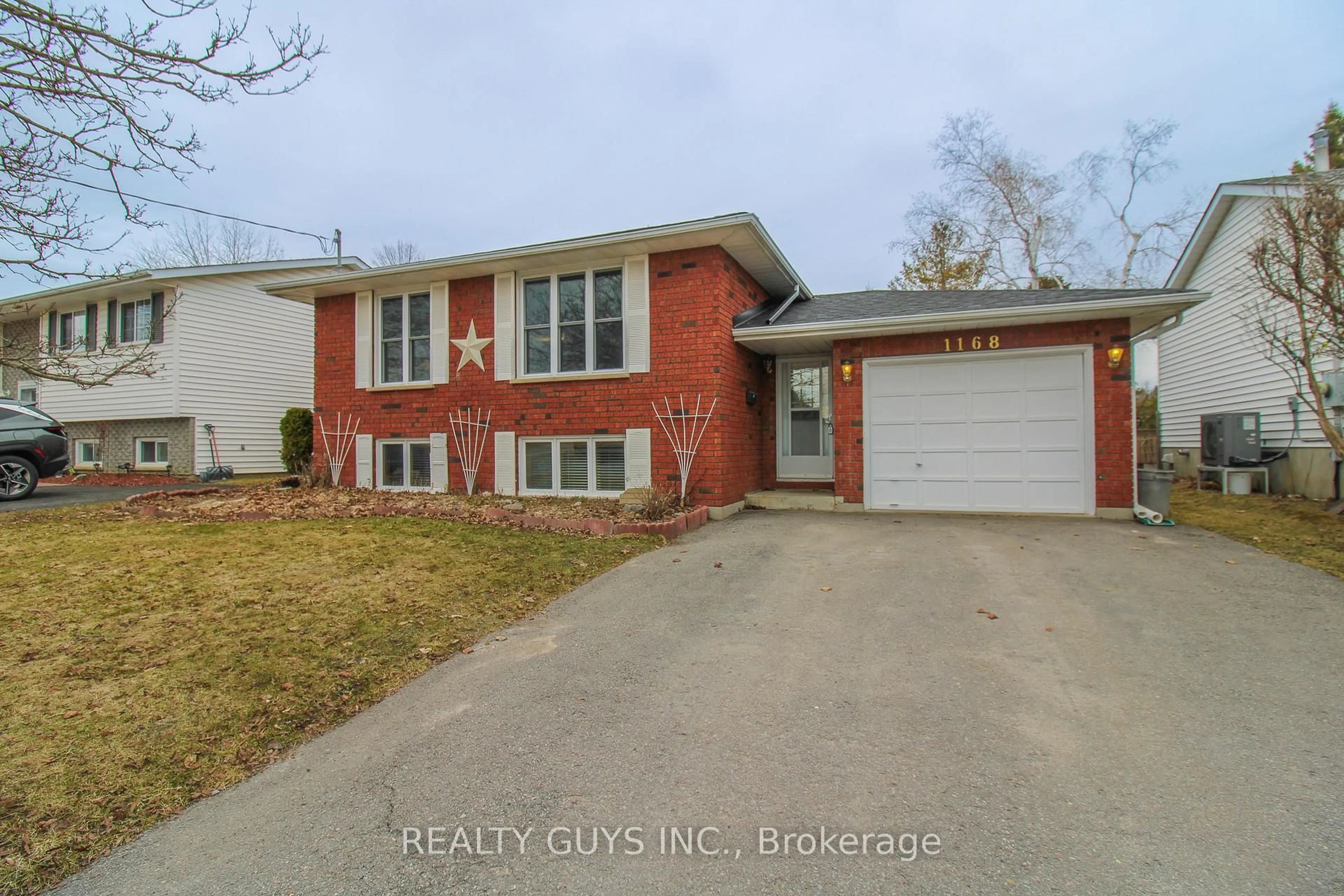 Home with brick exterior material, street for 1168 Normandy St, Peterborough Ontario K9H 7L9