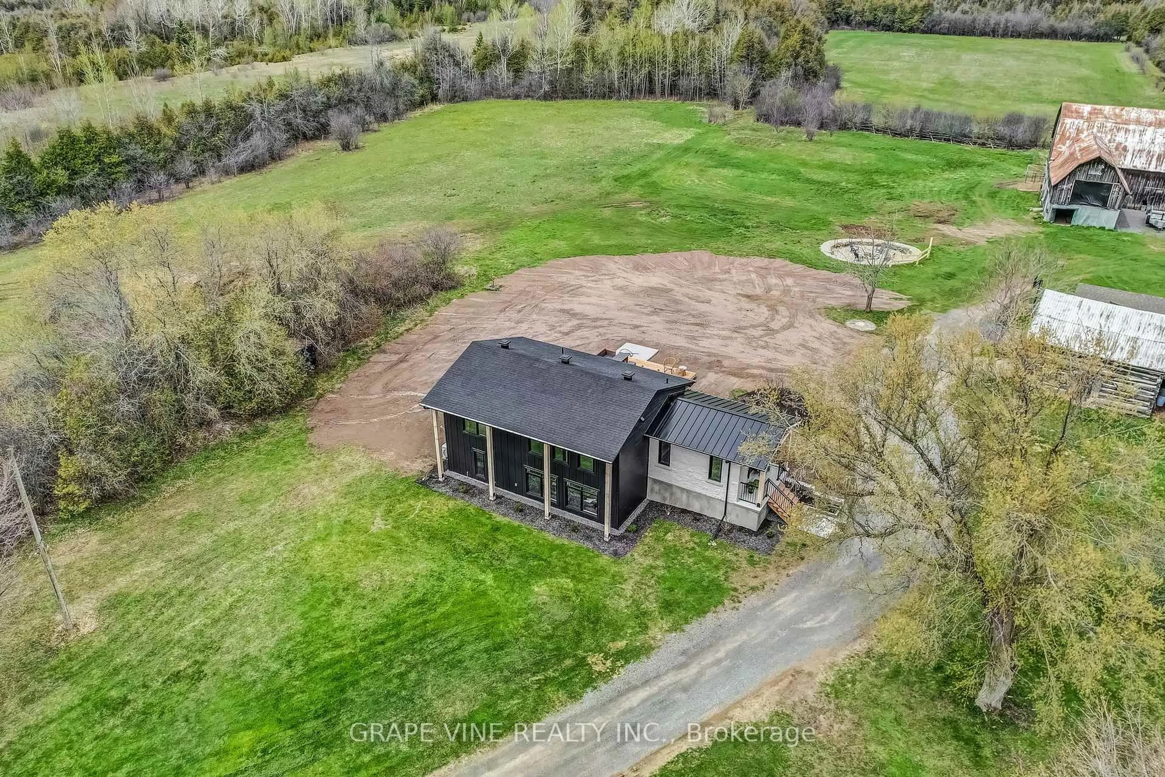 A pic from outside/outdoor area/front of a property/back of a property/a pic from drone, water/lake/river/ocean view for 1671 County RD 43 Rd, North Grenville Ontario K0G 1G0