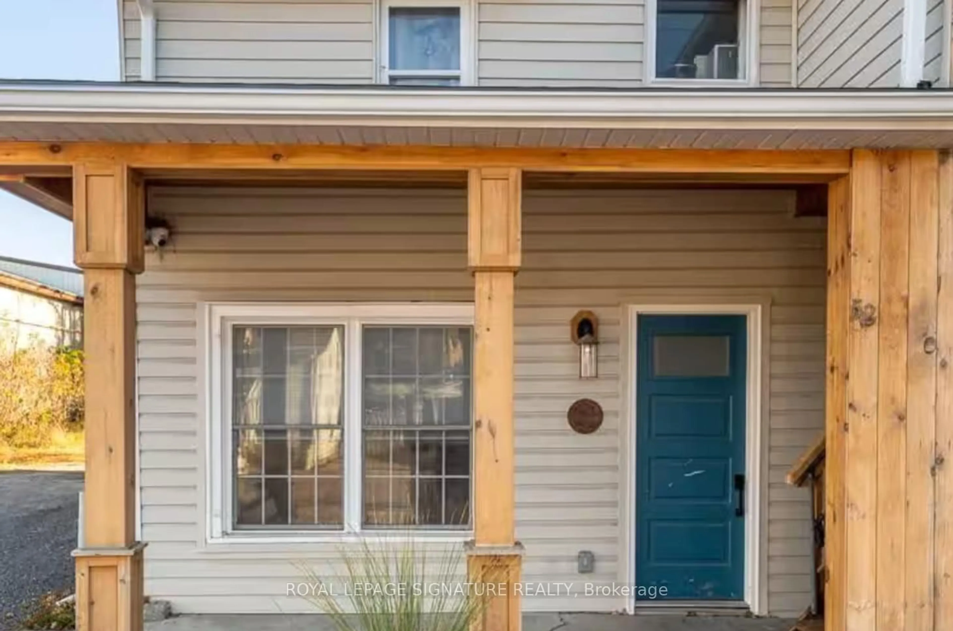 Home with vinyl exterior material, street for 52 PICTON MAIN St, Prince Edward County Ontario K0K 2T0