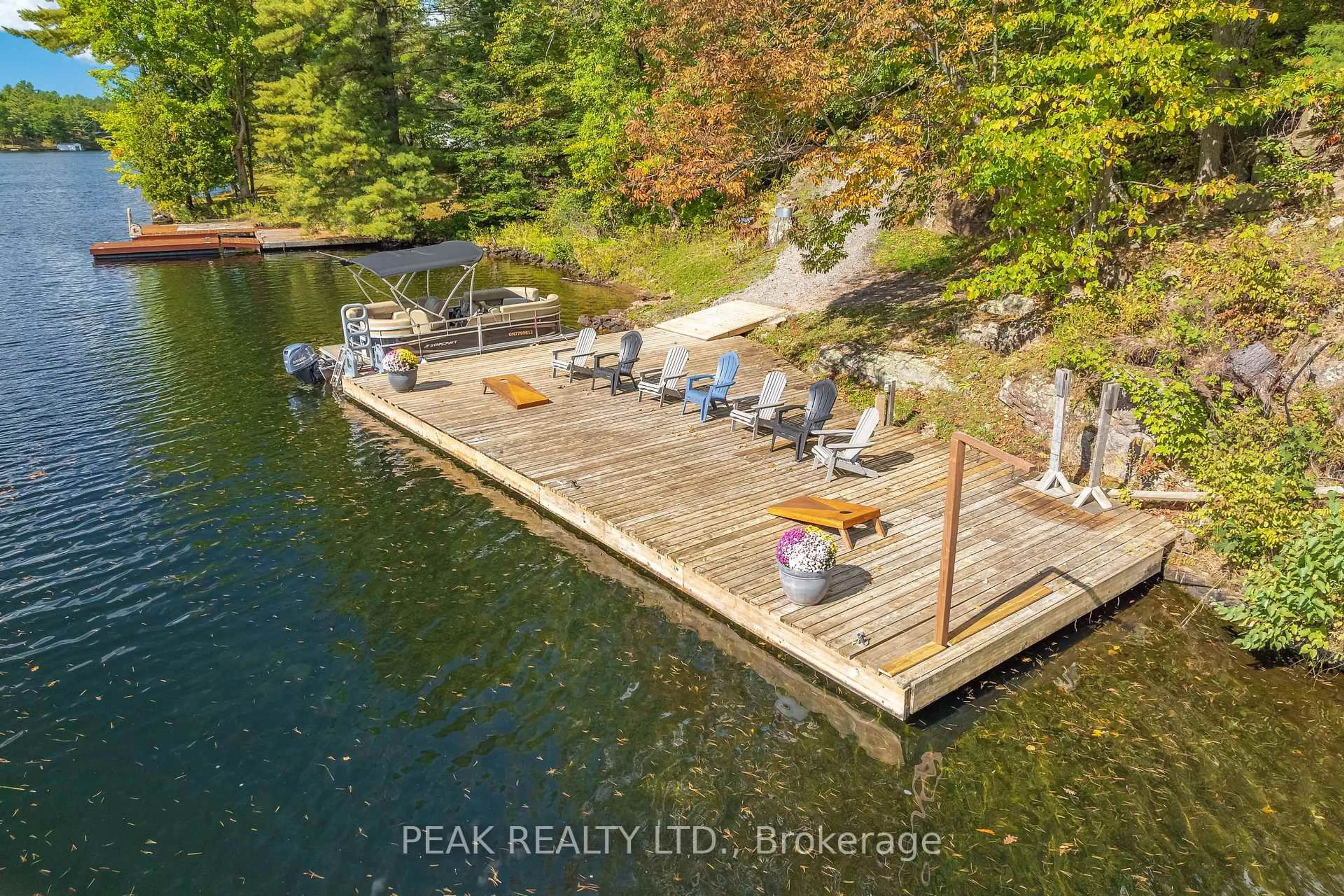 A pic from outside/outdoor area/front of a property/back of a property/a pic from drone, water/lake/river/ocean view for 49 Severn River SR 405, Muskoka Lakes Ontario 00000
