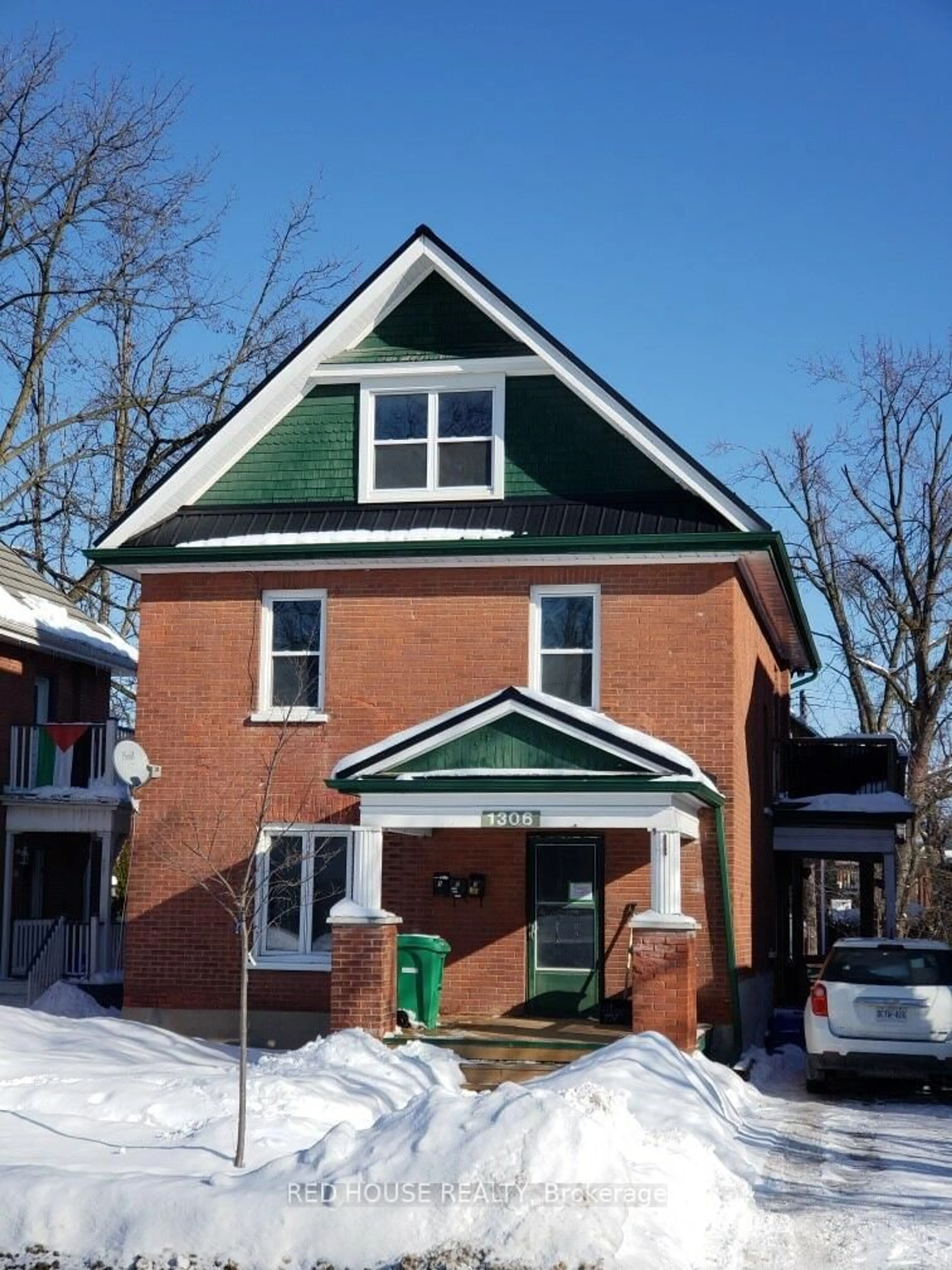 Home with brick exterior material, street for 1306 Monaghan Rd, Peterborough Ontario K9J 5M1