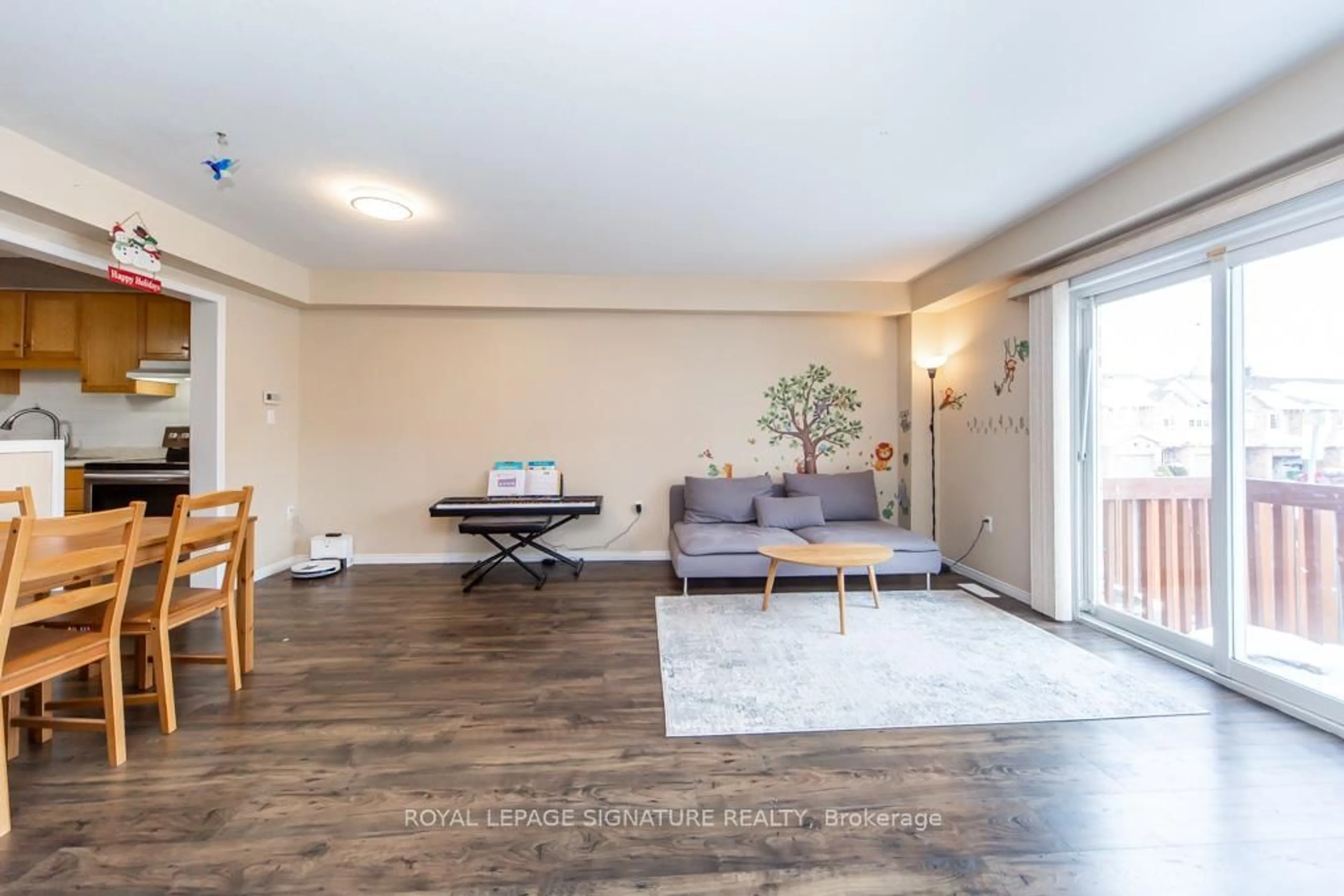 Living room with furniture, wood/laminate floor for 346 Highland Rd #34, Hamilton Ontario L8J 3T3