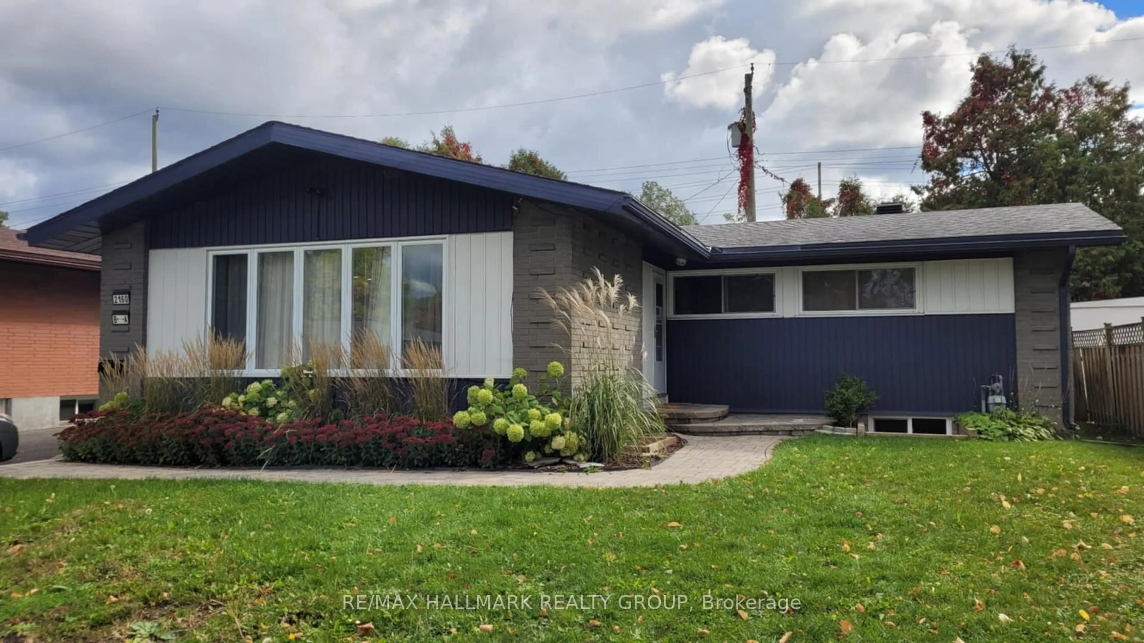 Home with vinyl exterior material, street for 2160 Lambeth Walk, Ottawa Ontario K2C 1G1