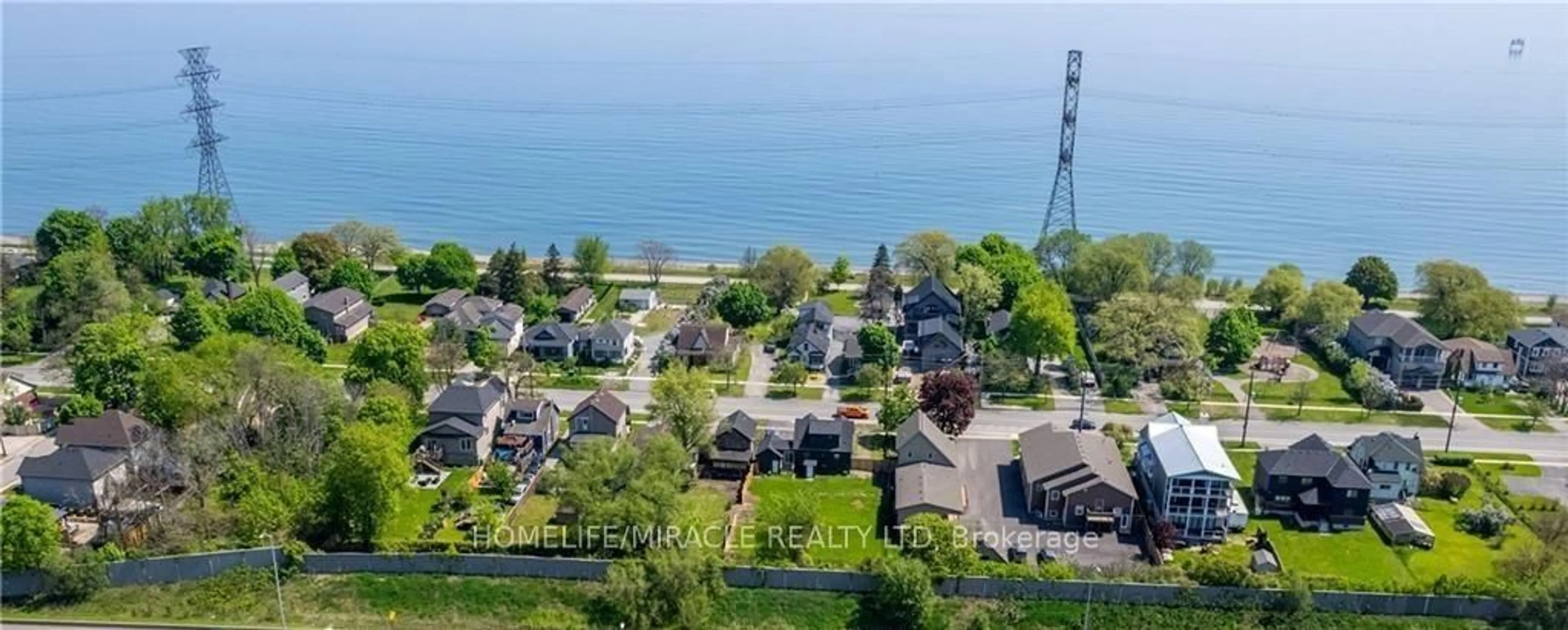 A pic from outside/outdoor area/front of a property/back of a property/a pic from drone, water/lake/river/ocean view for 198 Beach Blvd, Hamilton Ontario L8H 6V9