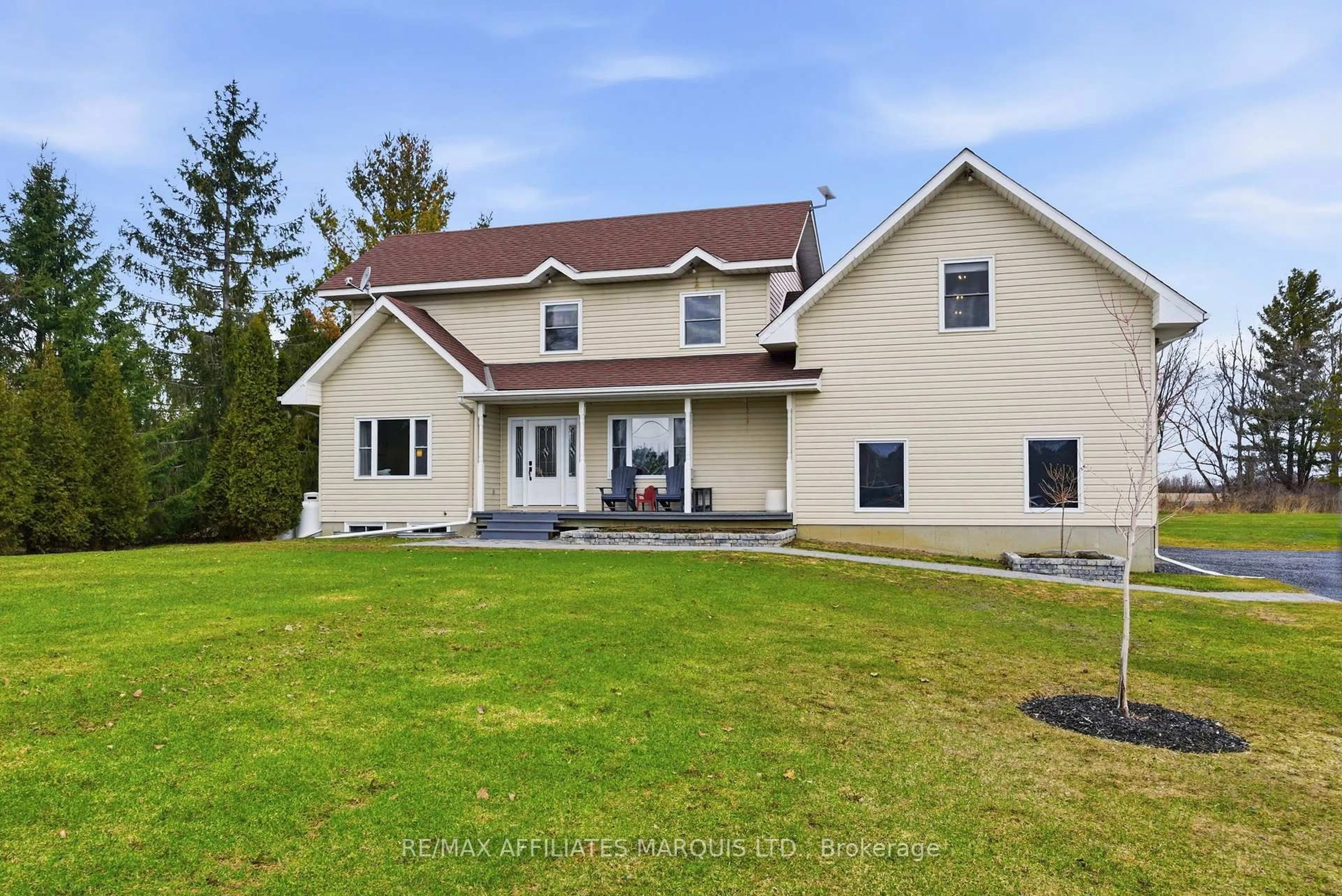 A pic from outside/outdoor area/front of a property/back of a property/a pic from drone, unknown for 14229 County Road 2 Rd, South Stormont Ontario K0C 1M0