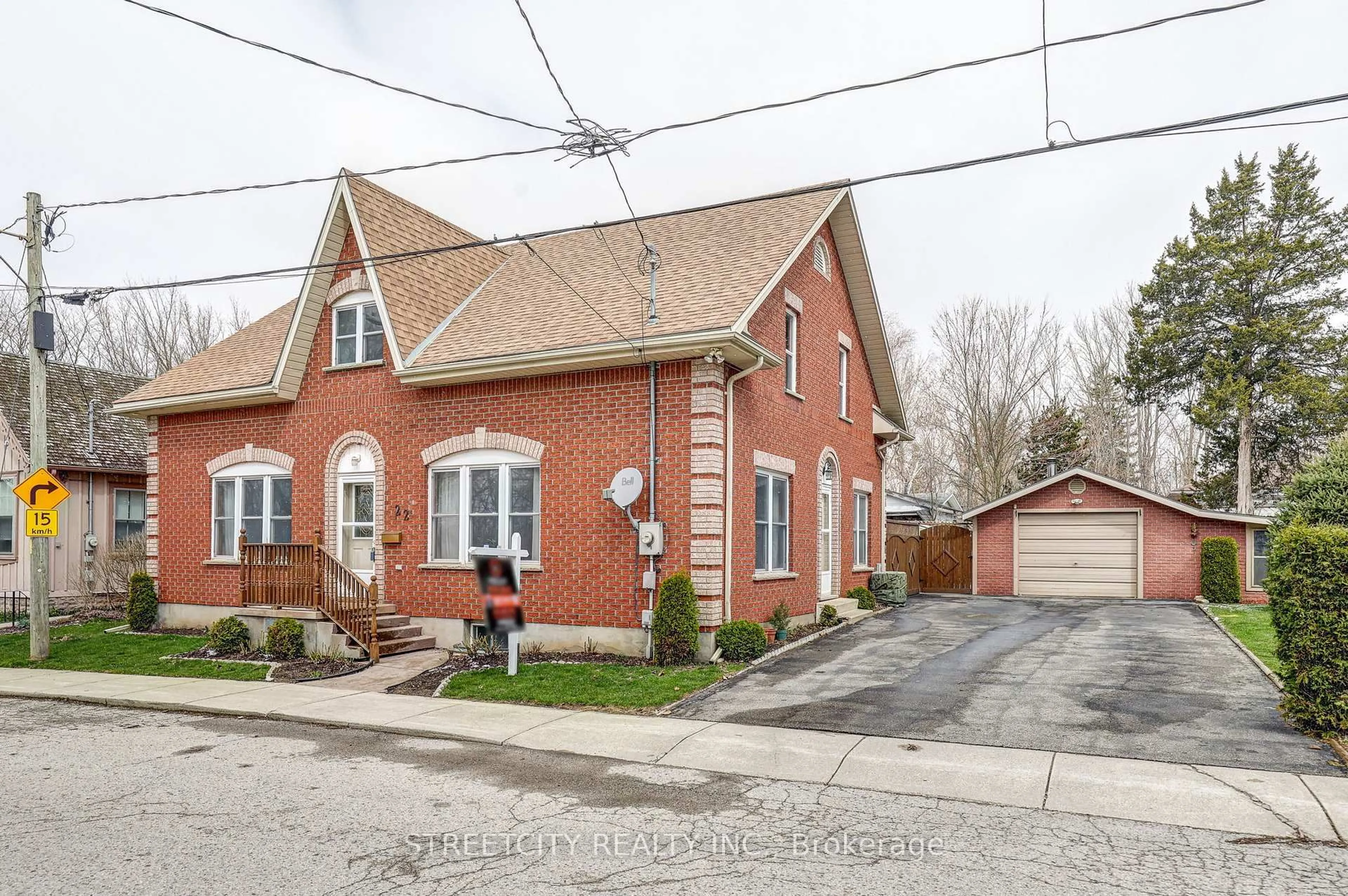 Home with brick exterior material, street for 22 Walnut St, St. Thomas Ontario N5R 2Y6