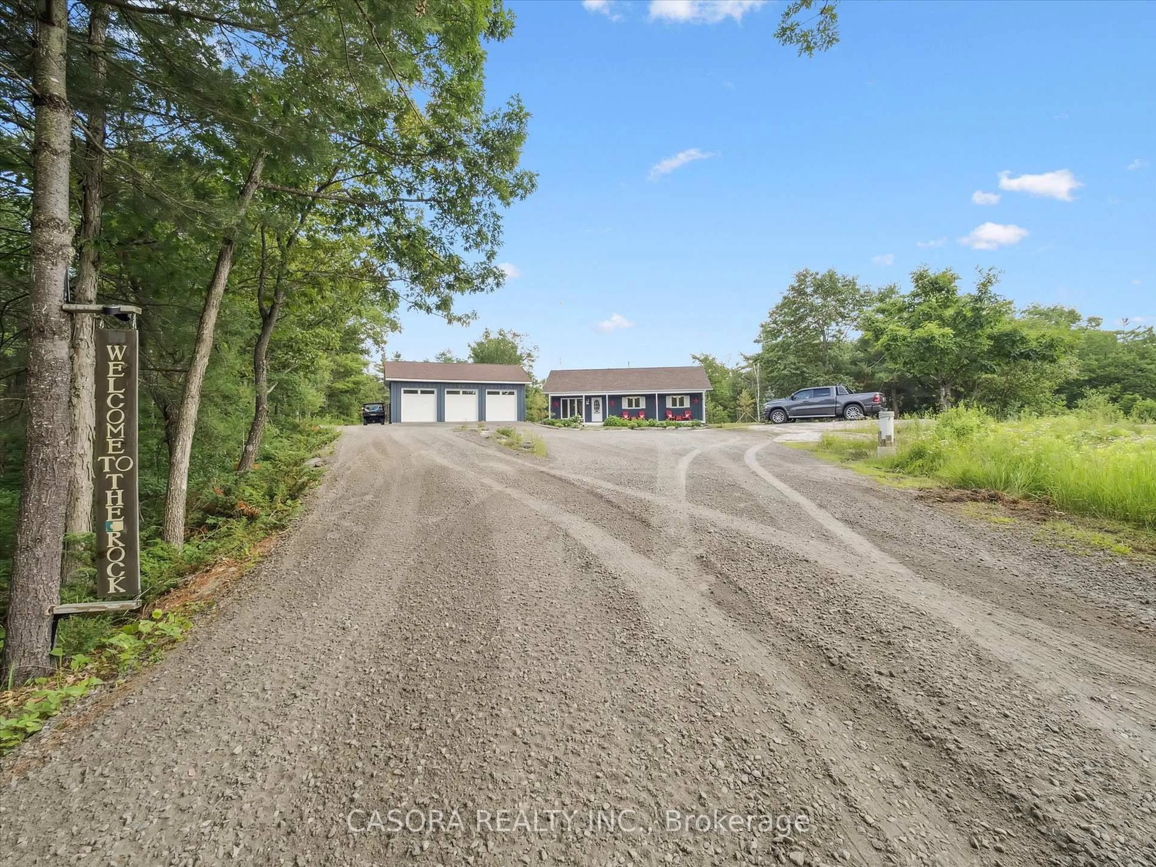 A pic from outside/outdoor area/front of a property/back of a property/a pic from drone, street for 891 Peninsula Rd, Gravenhurst Ontario P1P 0E2