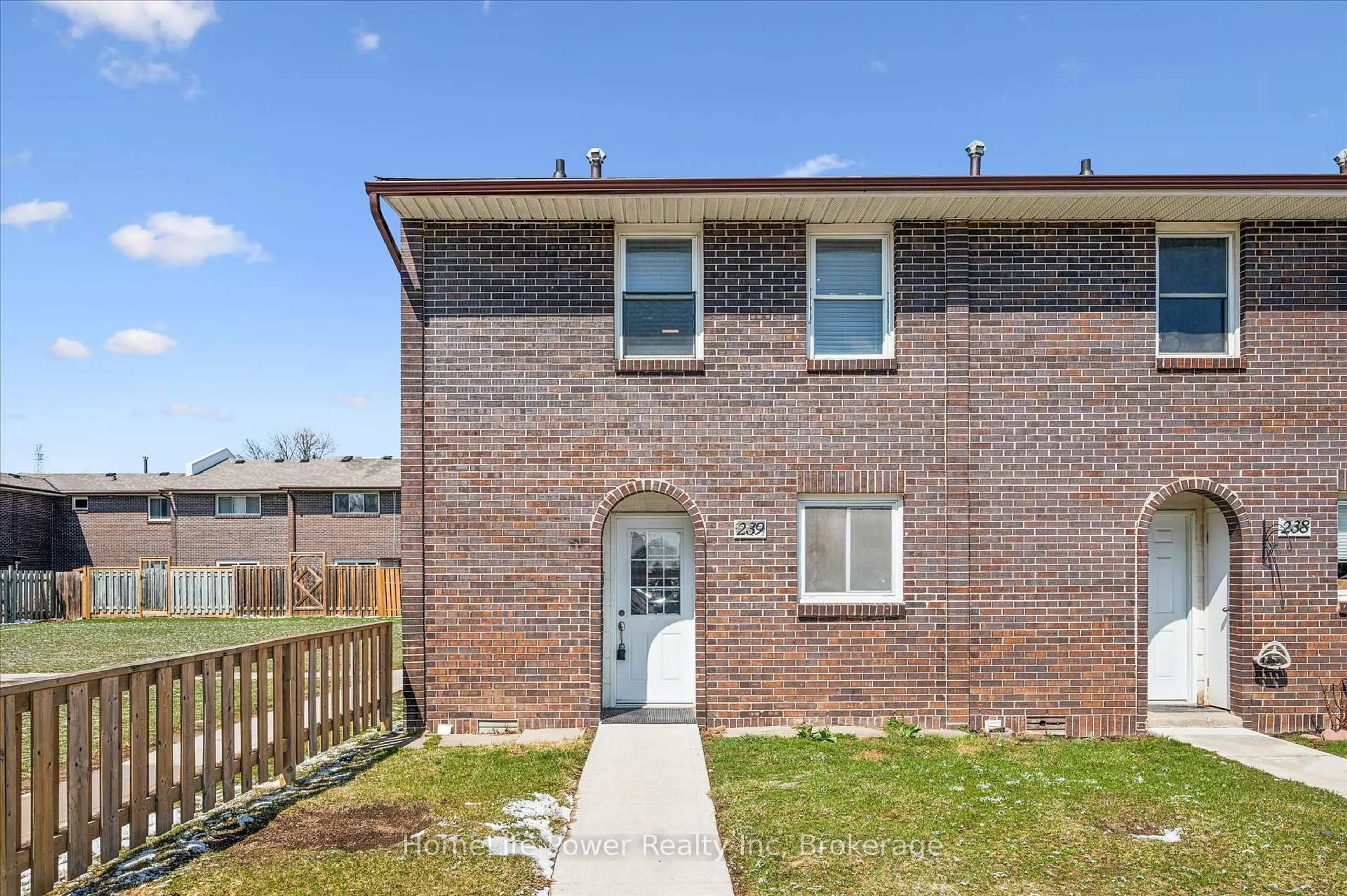 Home with brick exterior material, street for 31 Greengate Rd #239, Guelph Ontario N1H 6R3