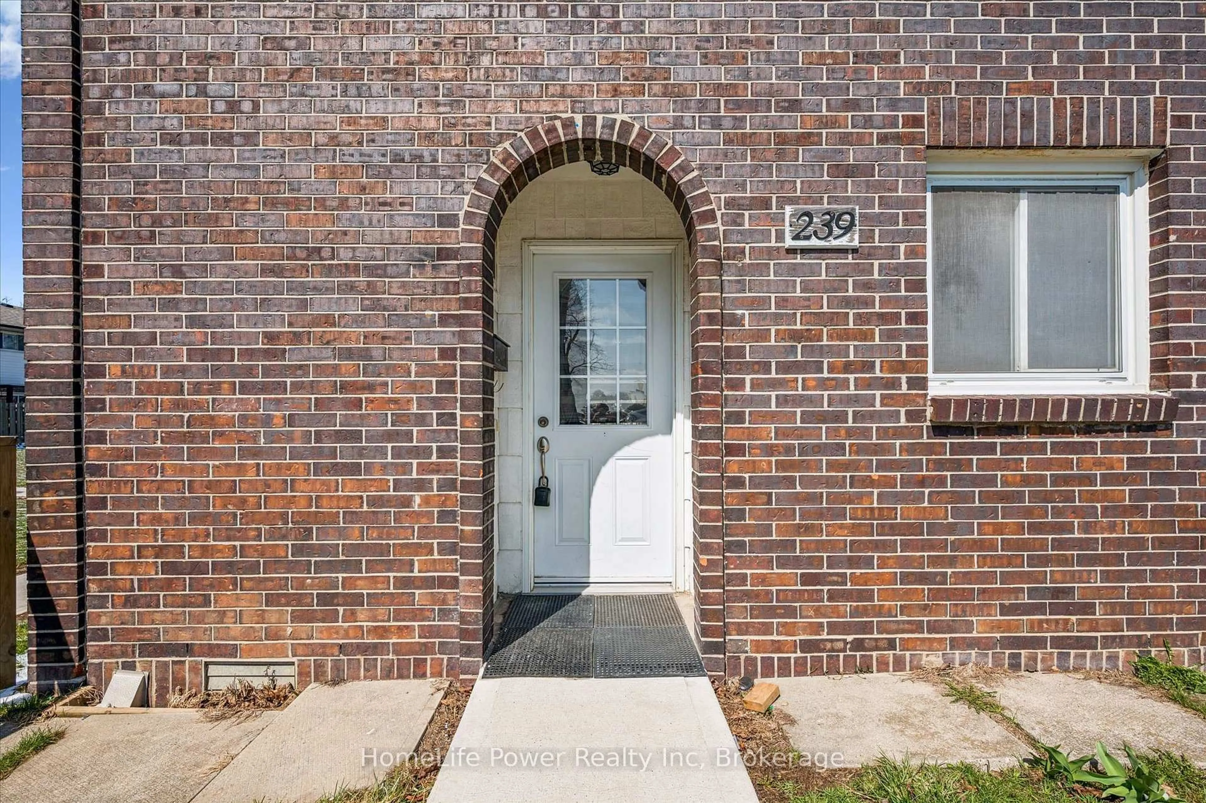 Home with brick exterior material, street for 31 Greengate Rd #239, Guelph Ontario N1H 6R3