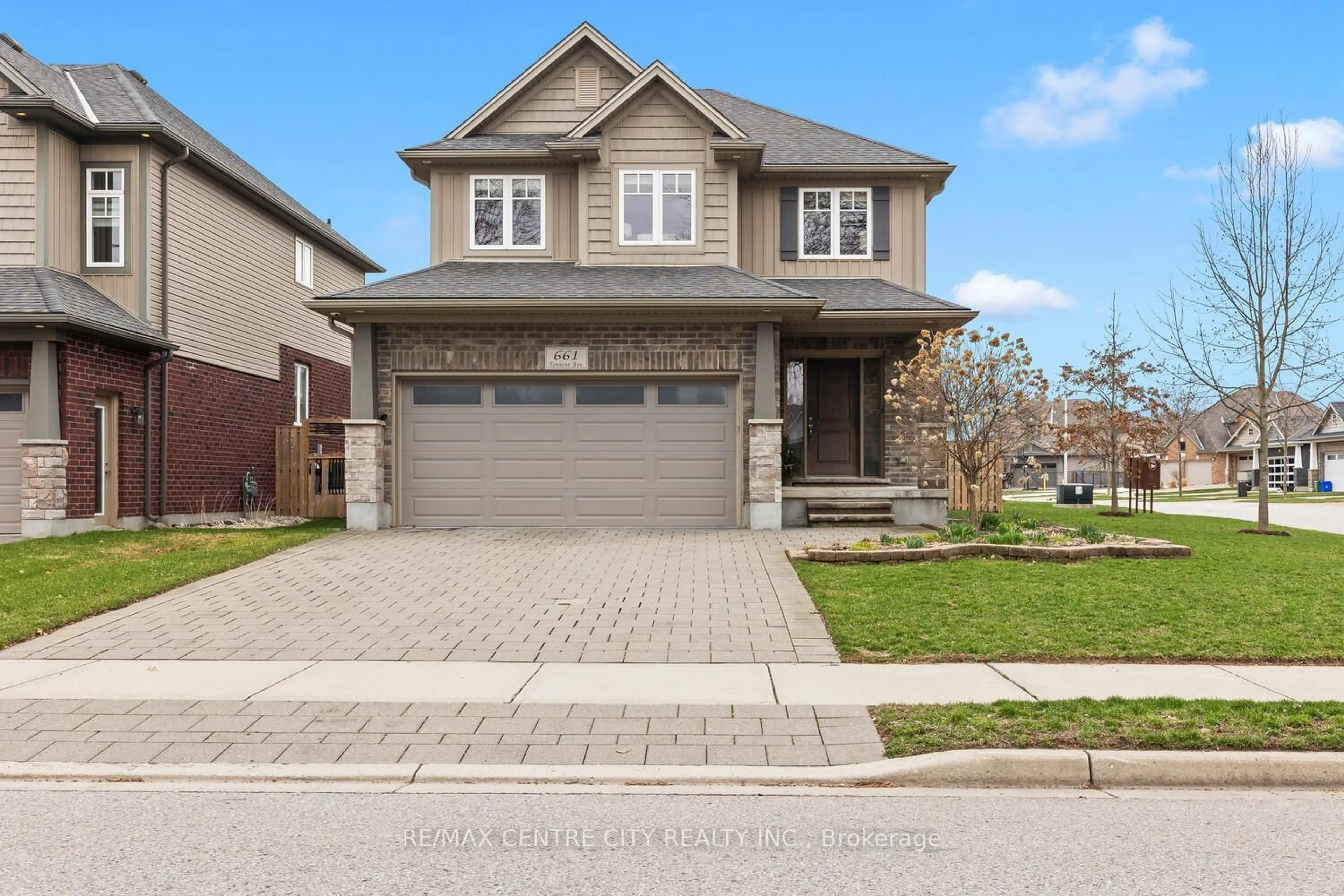 Home with brick exterior material, street for 661 Tennent Ave, London North Ontario N5X 0L2