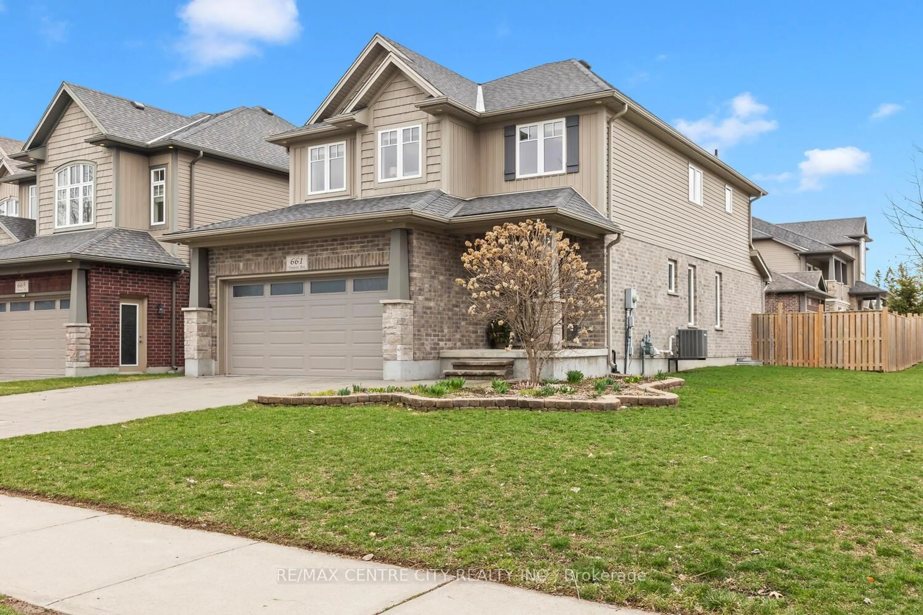 Home with brick exterior material, street for 661 Tennent Ave, London North Ontario N5X 0L2