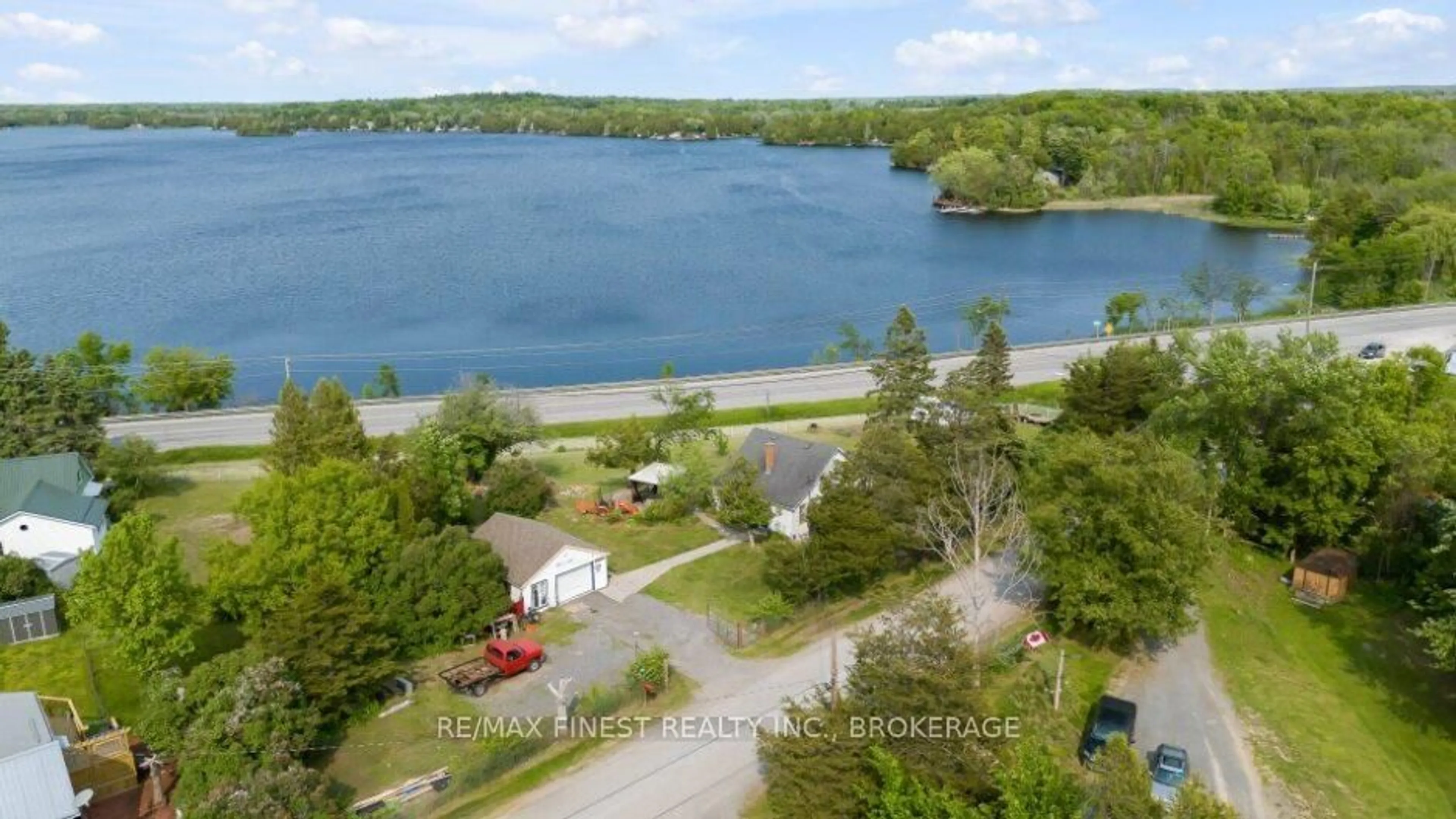 A pic from outside/outdoor area/front of a property/back of a property/a pic from drone, water/lake/river/ocean view for 21 Furlong Rd, Stone Mills Ontario K0K 2A0