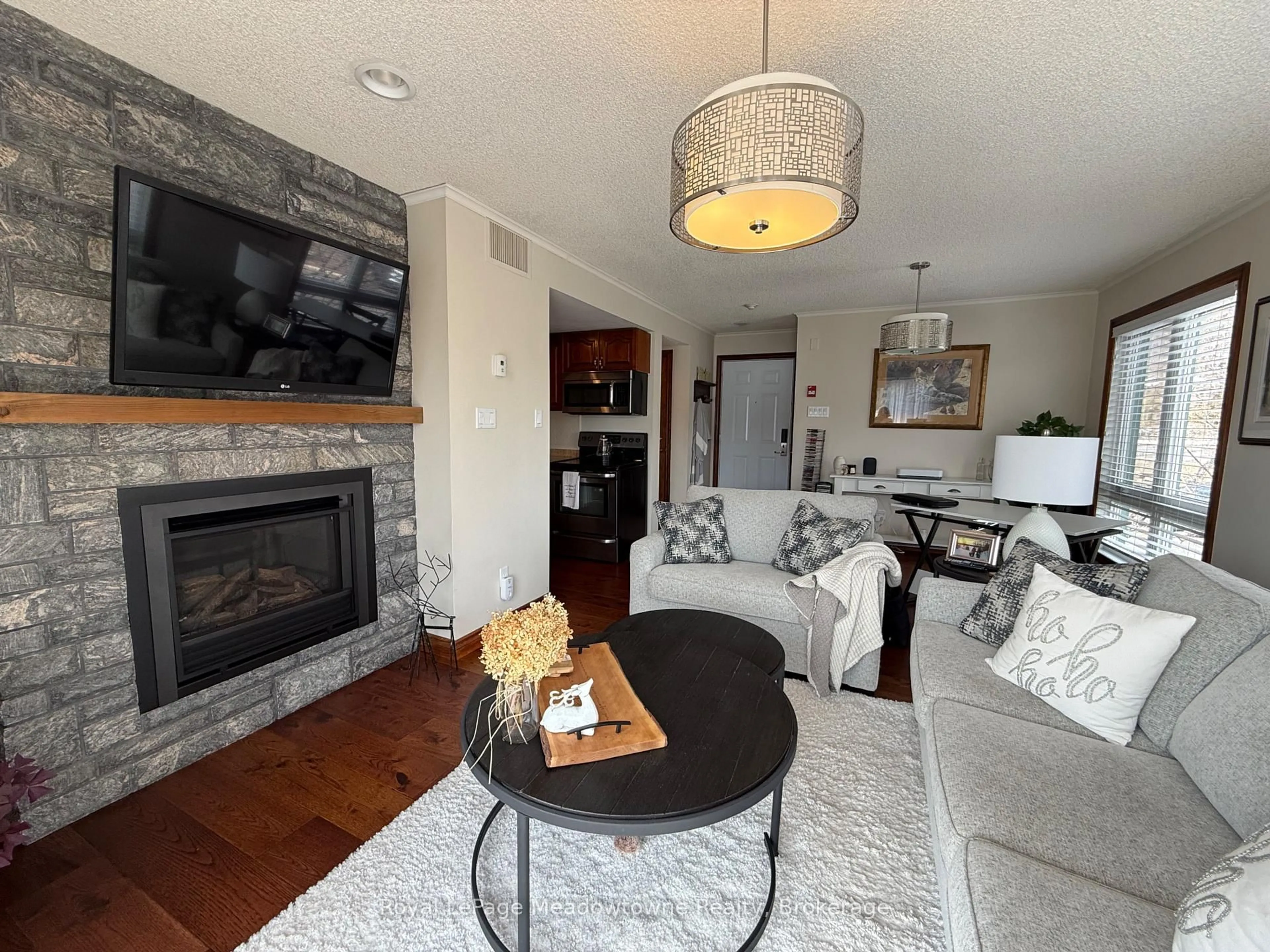 Living room with furniture, unknown for 34 Deerhurst Greens Rd #301, Huntsville Ontario P1H 1A9