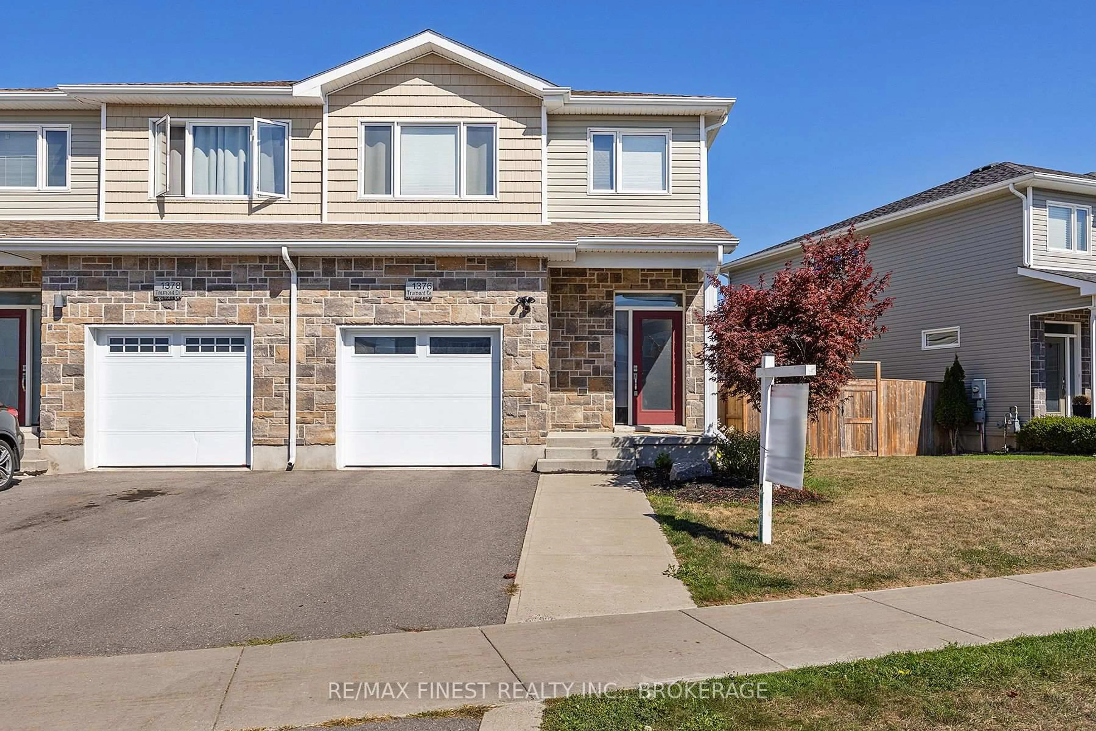 Home with vinyl exterior material, street for 1376 Tremont Dr, Kingston Ontario K7P 0M6