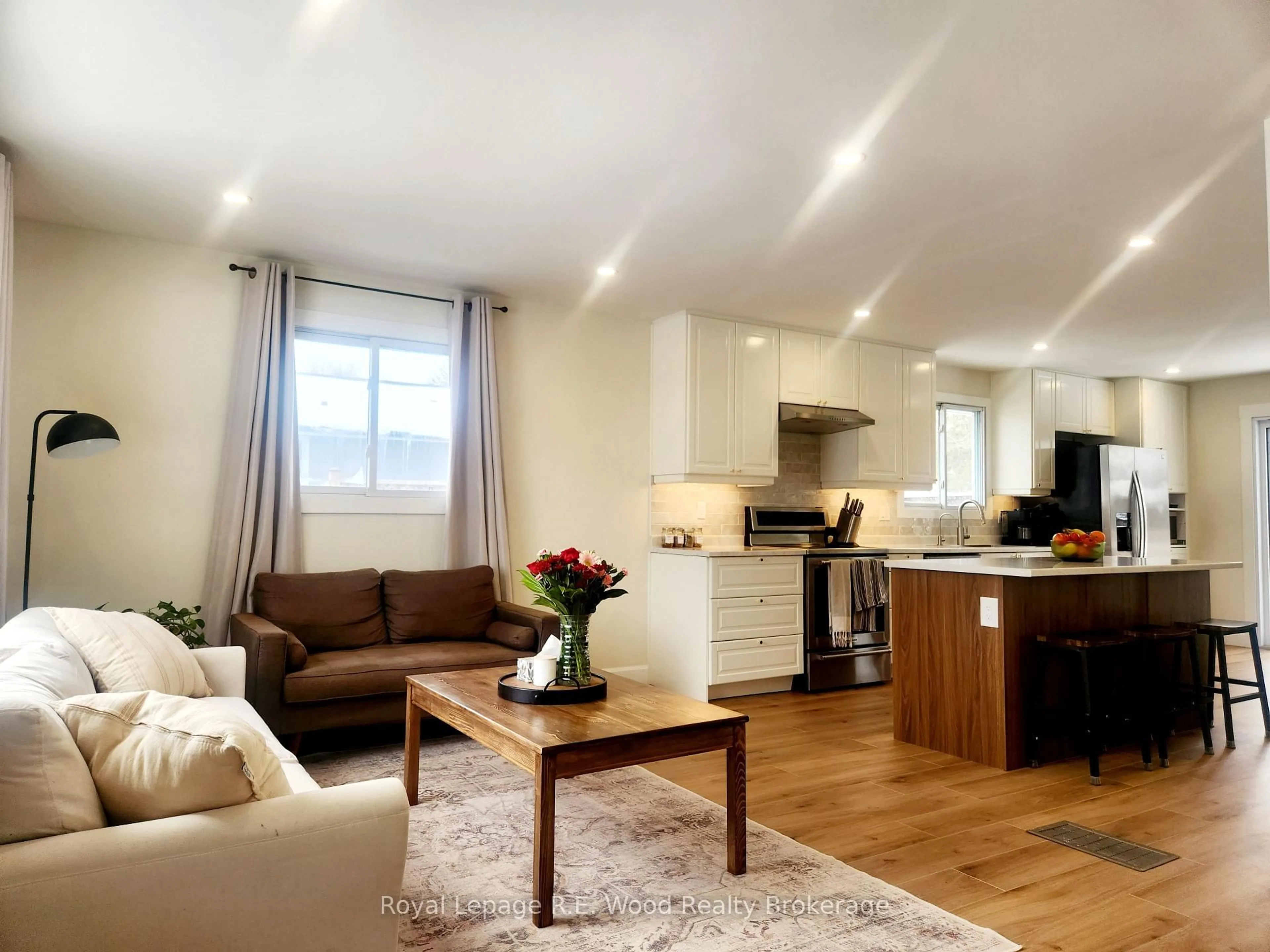 Open concept kitchen, wood/laminate floor for 6 Centennial Ave, Tillsonburg Ontario N4G 4R6