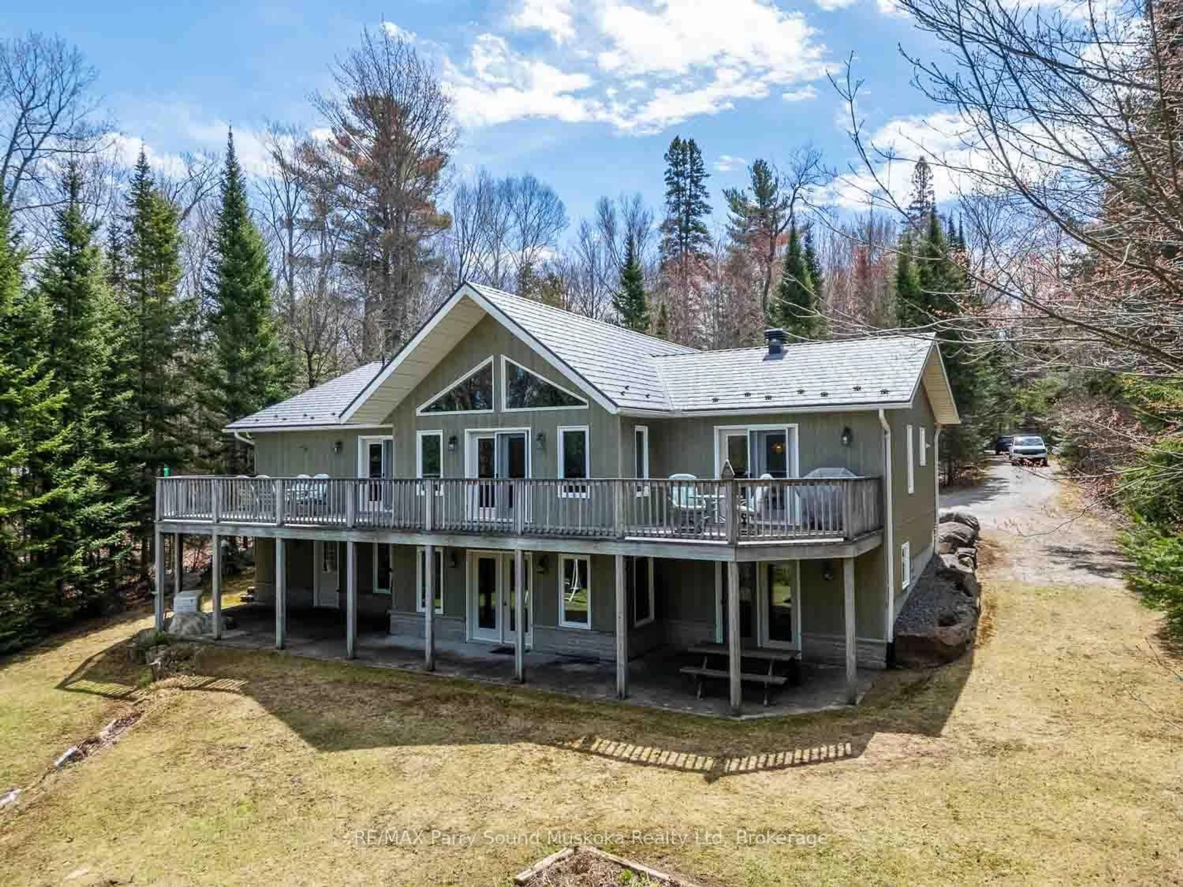 A pic from outside/outdoor area/front of a property/back of a property/a pic from drone, water/lake/river/ocean view for 1889 South Horn Lake Rd, Magnetawan Ontario P0A 1P0