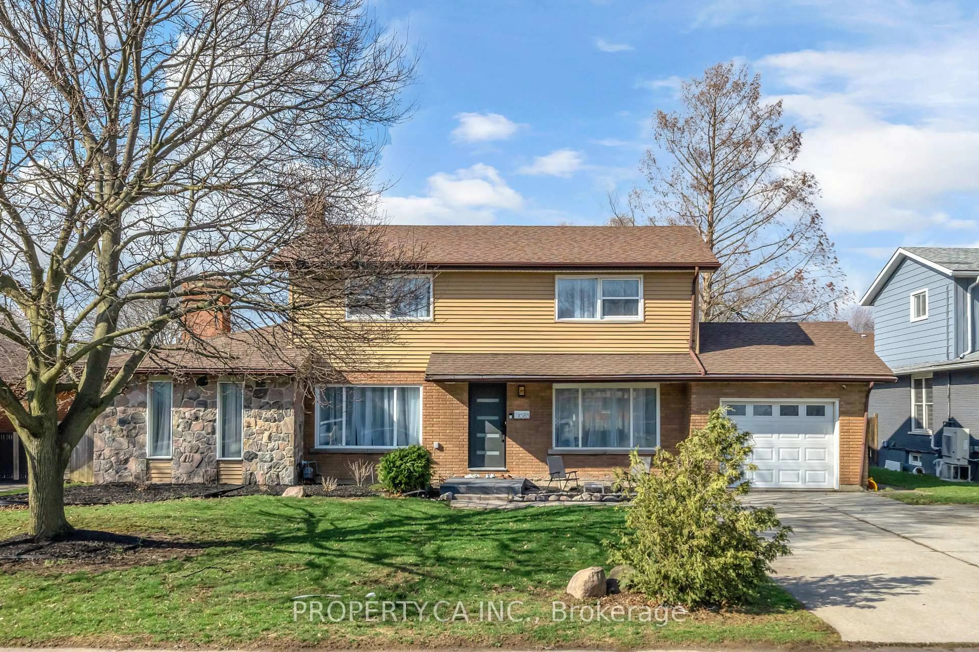 Home with brick exterior material, street for 7063 McGill St, Niagara Falls Ontario L2J 1L8