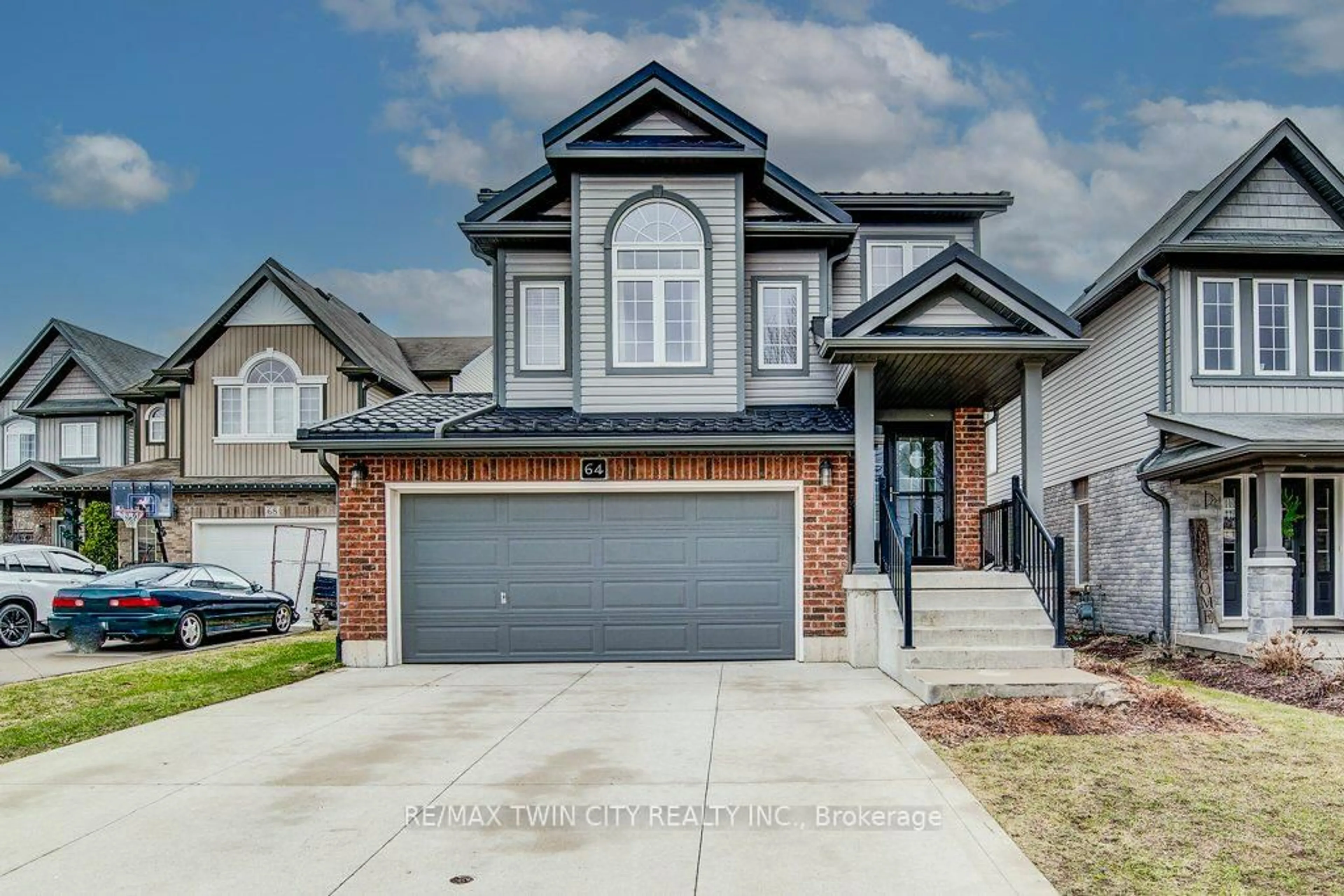 Home with vinyl exterior material, street for 64 Smith's Creek Dr, Wilmot Ontario N3A 0B3