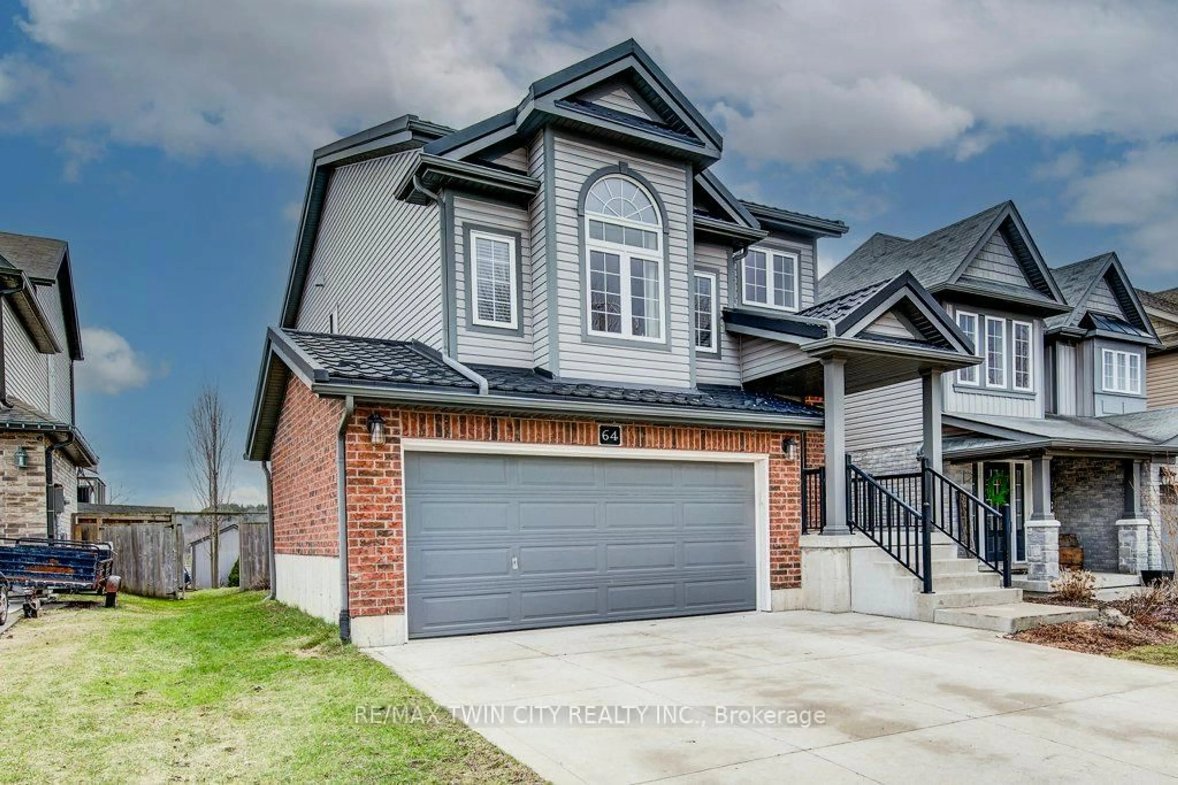 Home with brick exterior material, street for 64 Smith's Creek Dr, Wilmot Ontario N3A 0B3