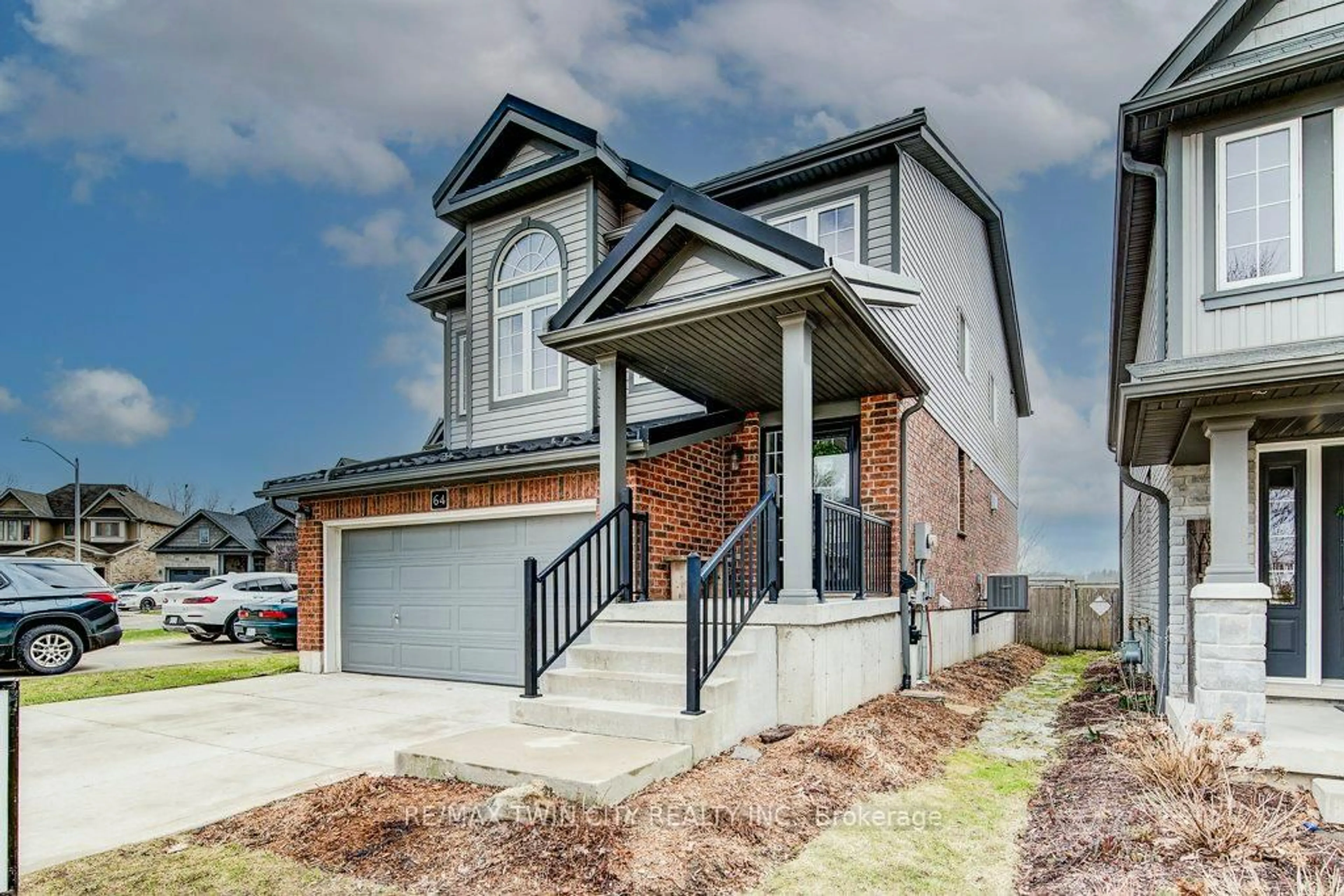 Home with brick exterior material, street for 64 Smith's Creek Dr, Wilmot Ontario N3A 0B3