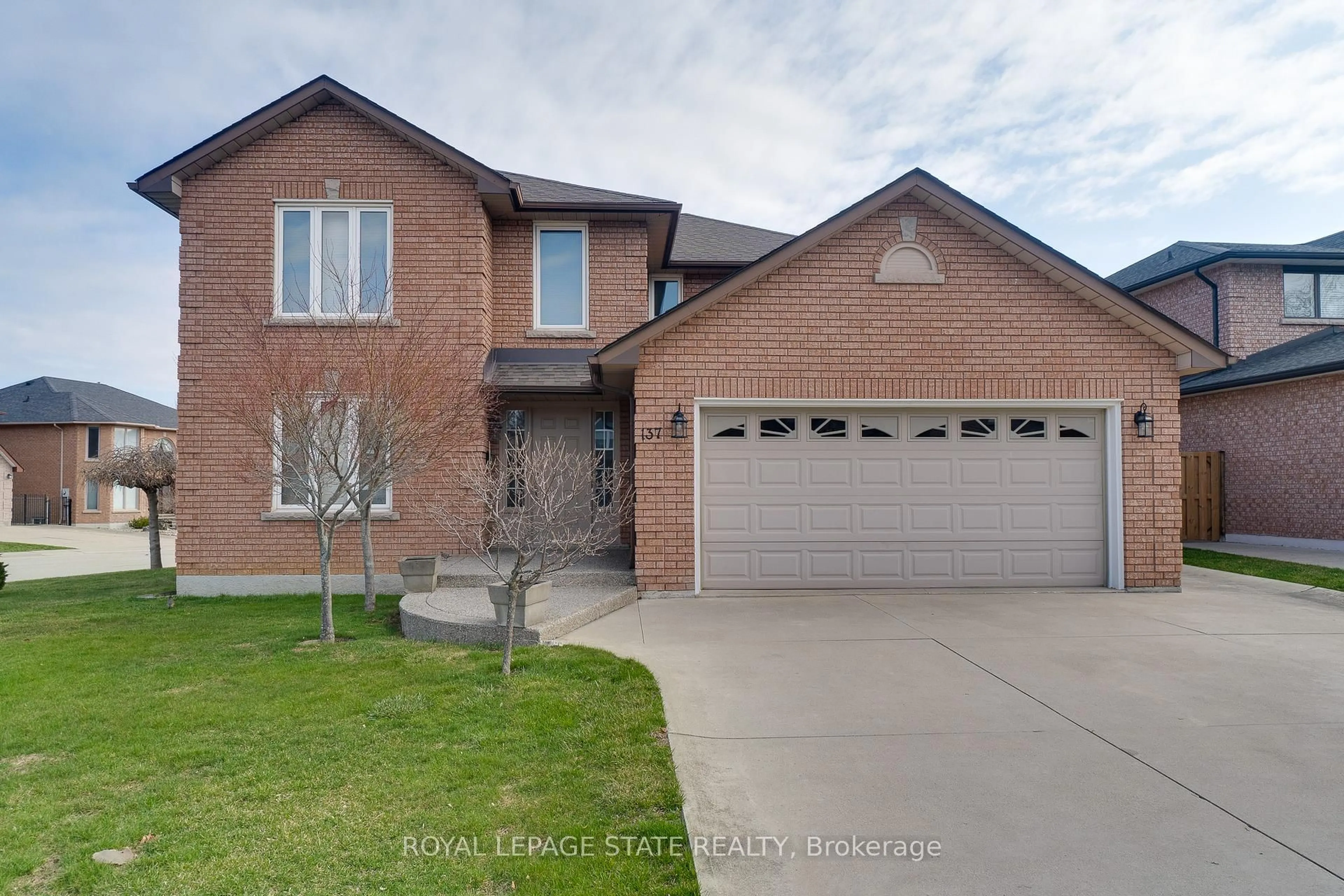 Home with brick exterior material, street for 137 National Dr, Hamilton Ontario L8G 5B3