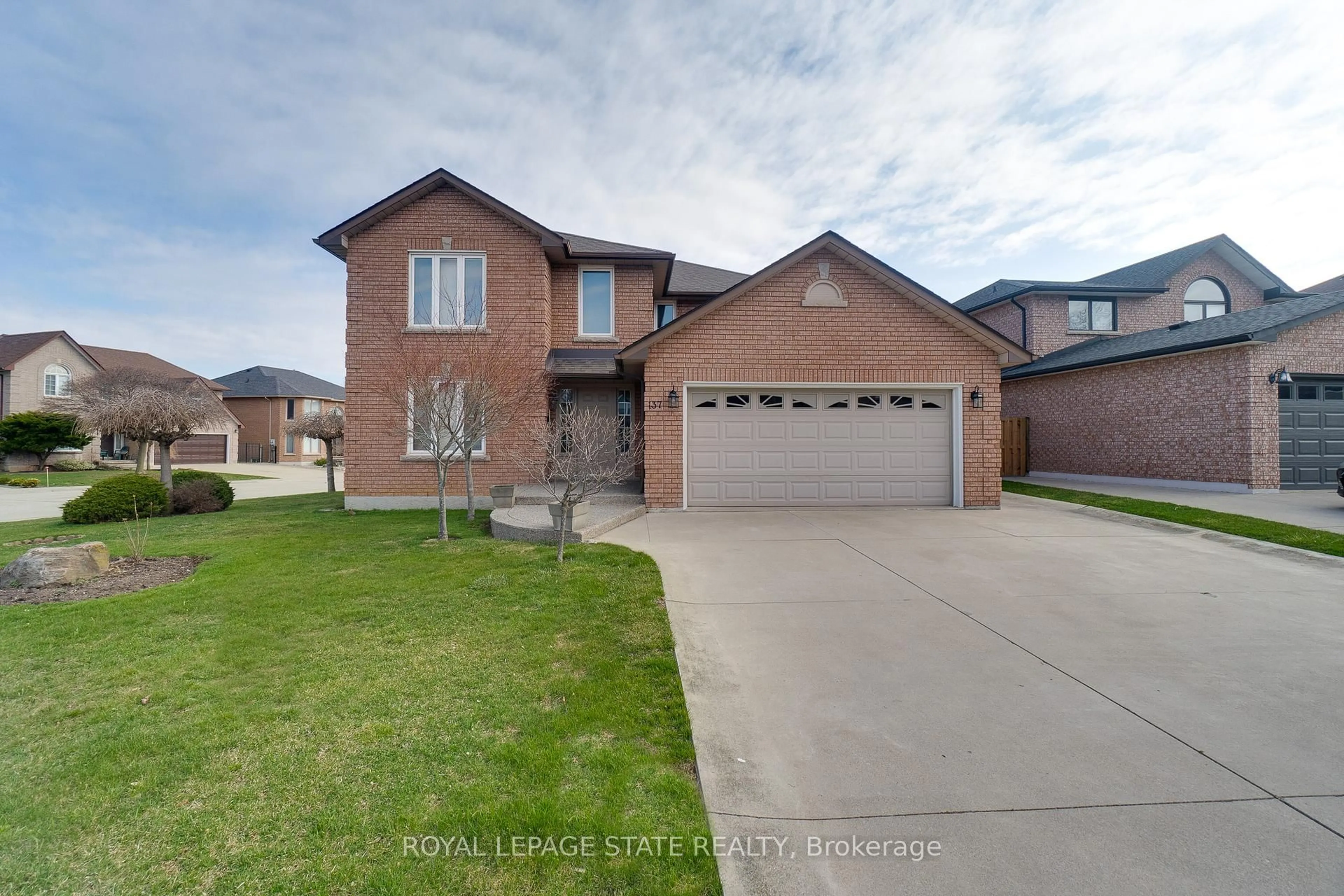 Home with brick exterior material, street for 137 National Dr, Hamilton Ontario L8G 5B3