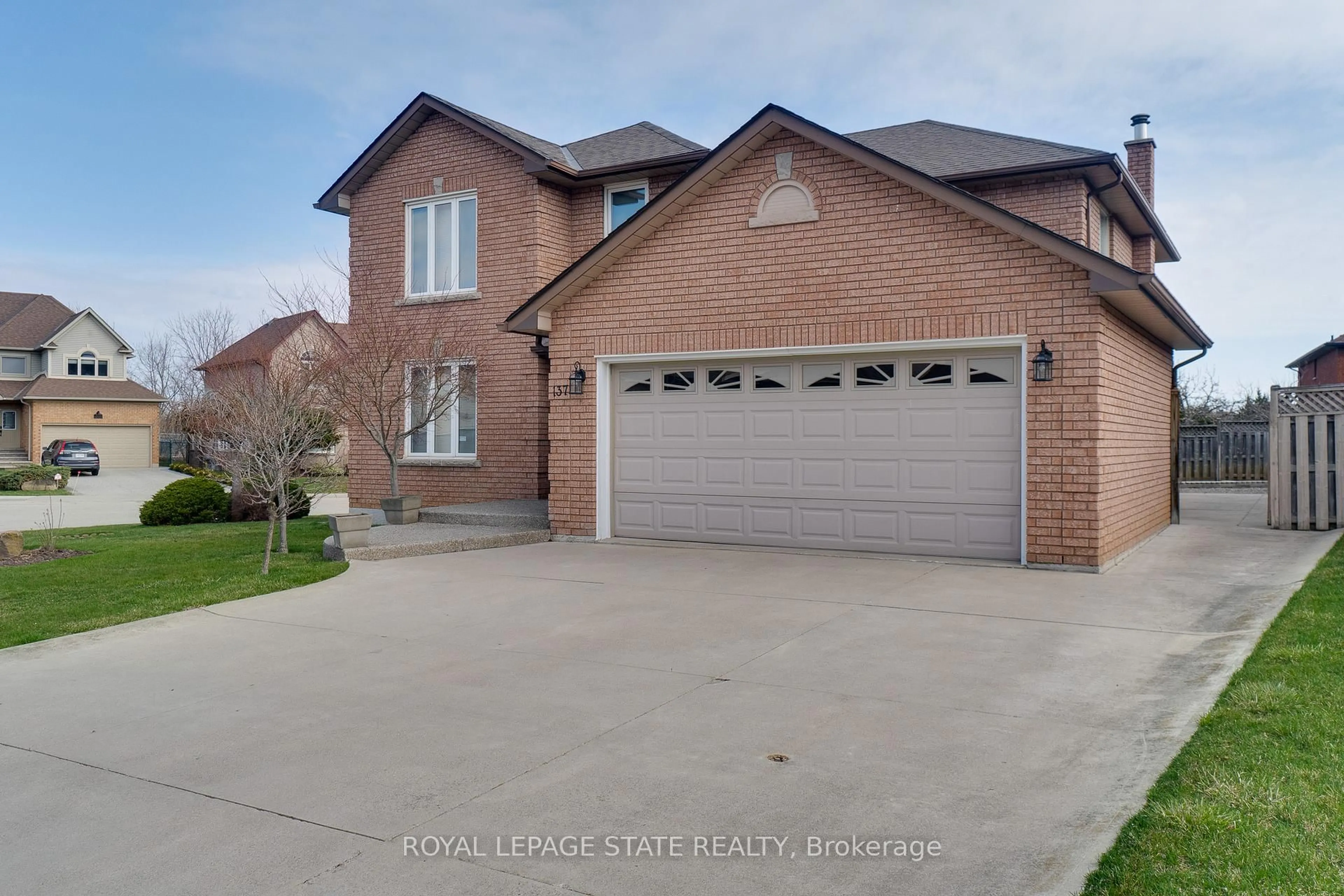 Home with brick exterior material, street for 137 National Dr, Hamilton Ontario L8G 5B3