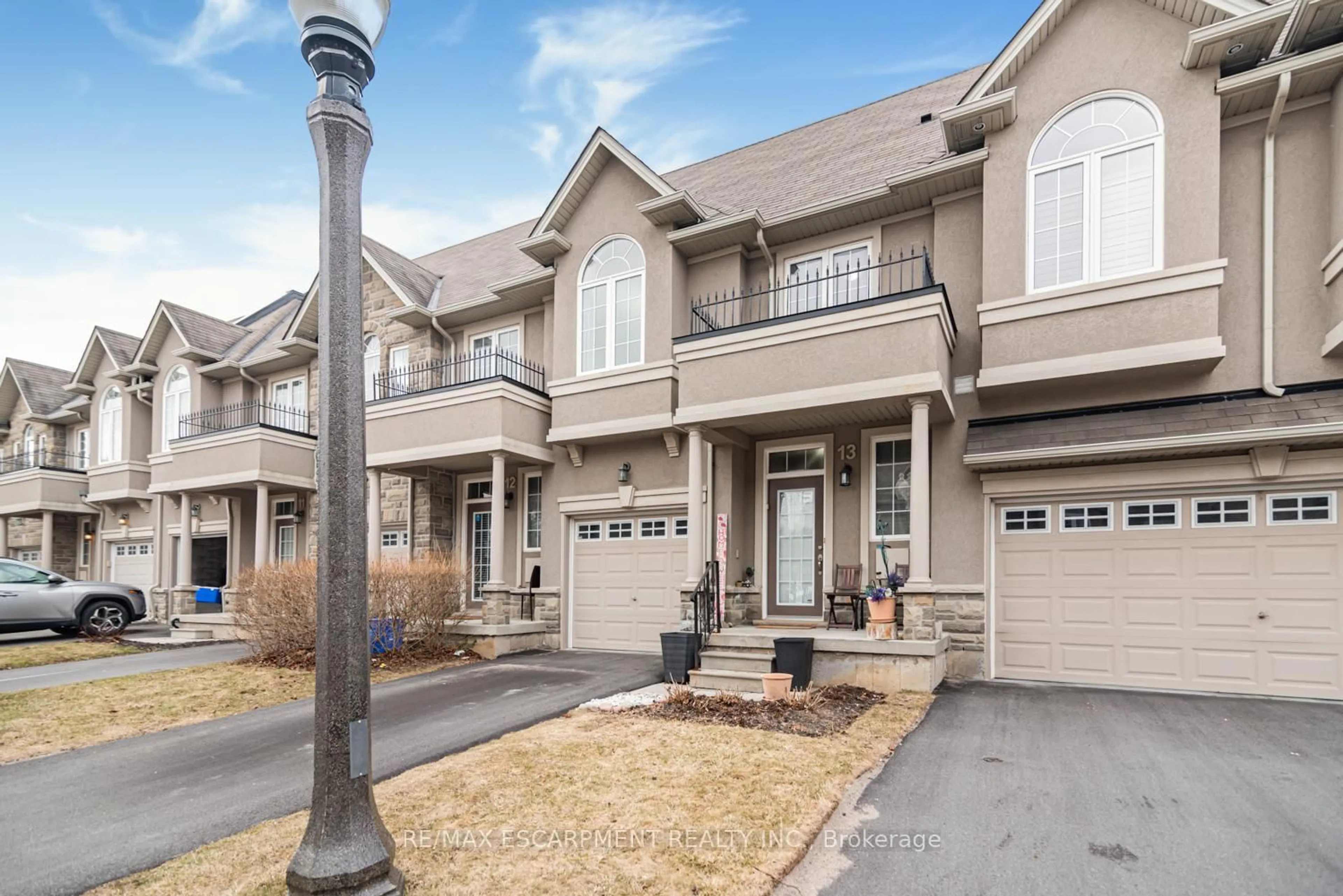 Home with brick exterior material, street for 370 Stonehenge Dr #13, Hamilton Ontario L9K 0H9